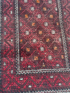 Pretty mid century Turkmen Baluch rug