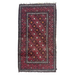 Pretty mid century Turkmen Baluch rug
