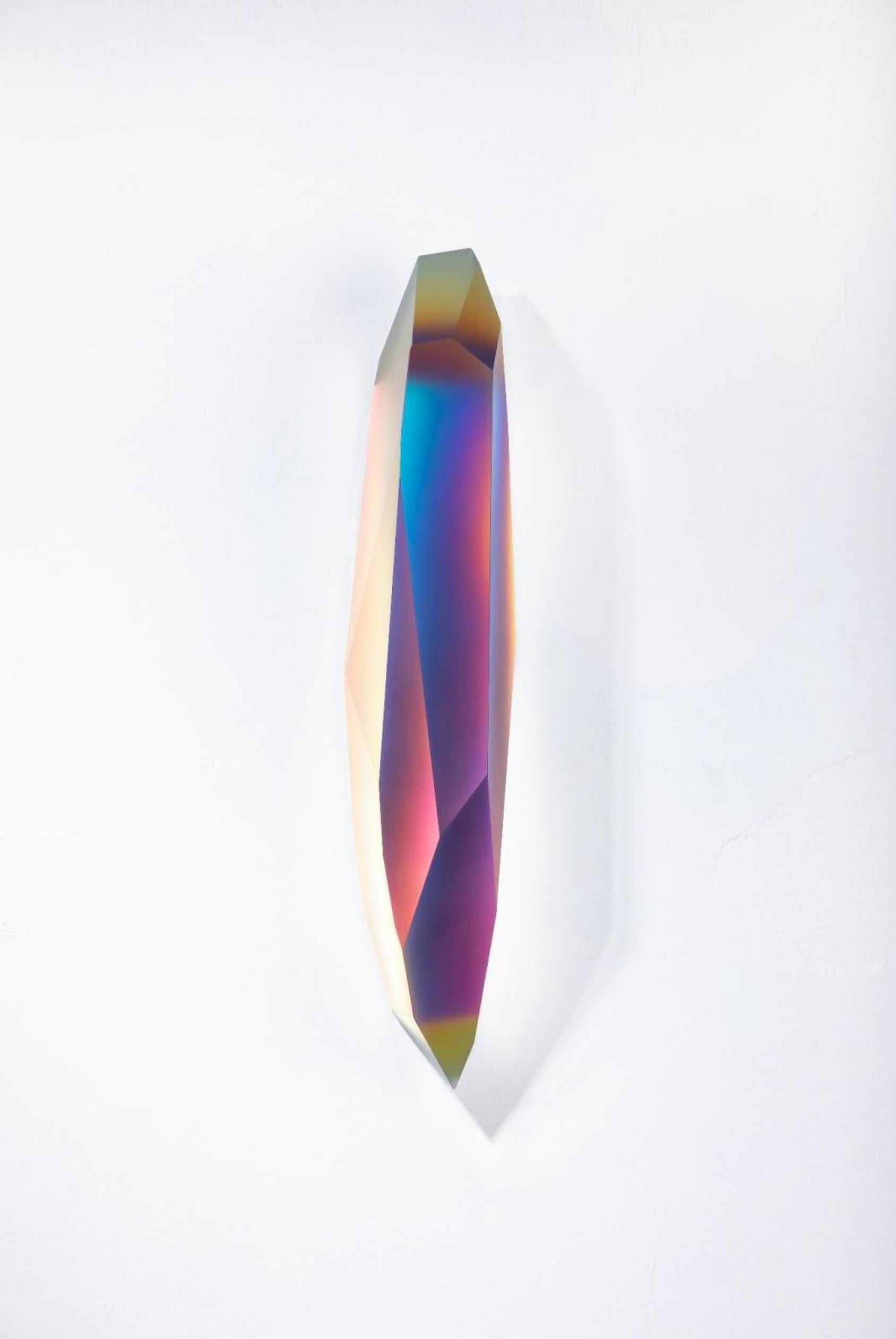 Pretty Mirage 0206 by Lukas Novak
Dimensions: W 16 x D 16 x H 63 cm
Materials: Cut Glass, Crystal, Color Gradient

The Pretty Mirage series is made out of wall crystals. It is a unique composition of cuts in glass and a color gradient. Lukas Novak