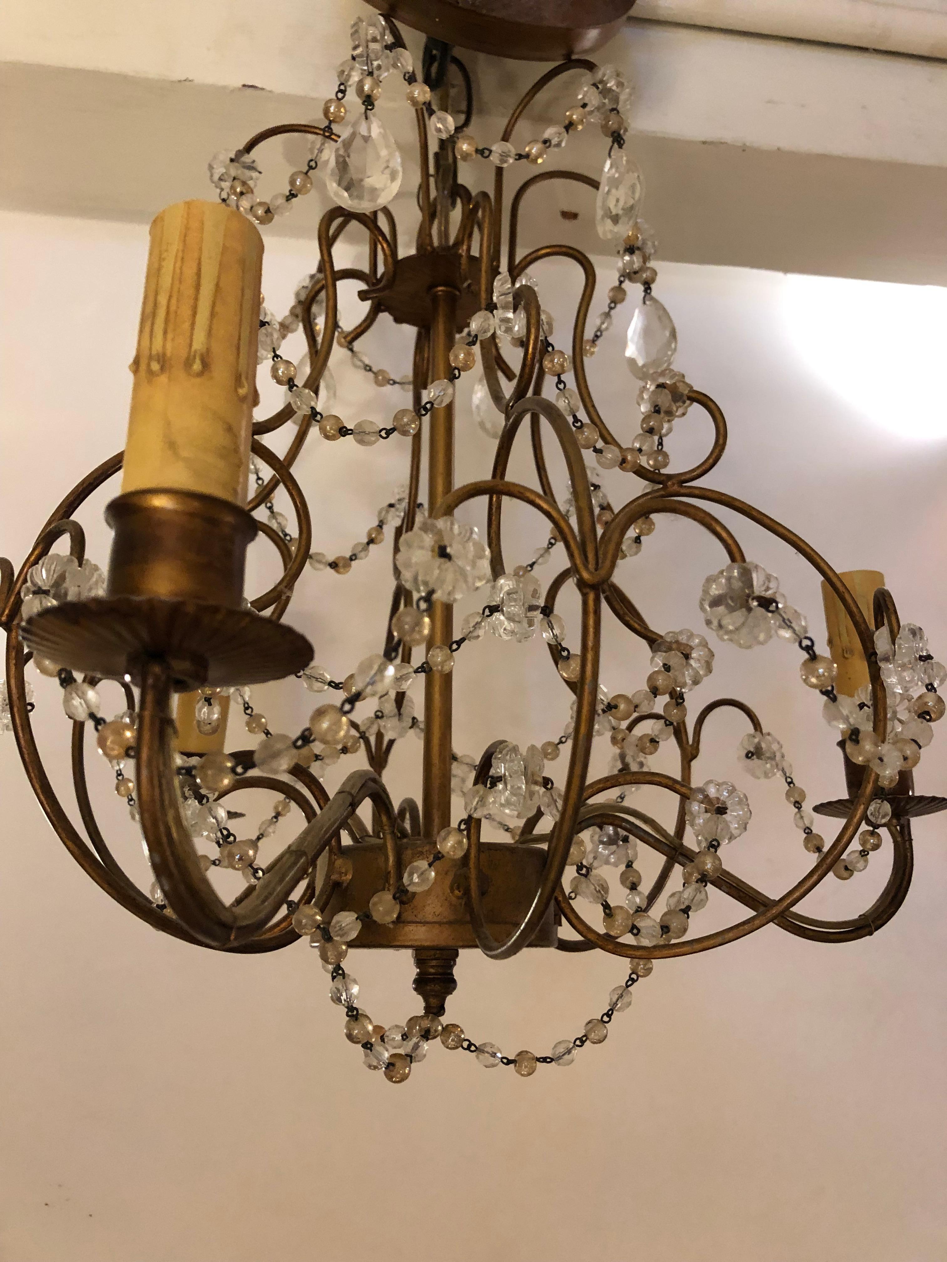 Metal Pretty Pair of Beaded and Gilded Italian Chandeliers For Sale
