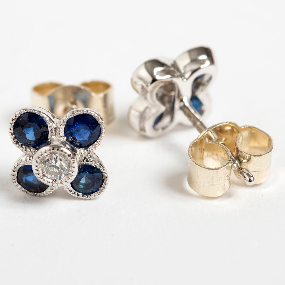 Pretty Petal Shaped Diamond & Sapphire Stud Earrings, .06 carat. In Excellent Condition For Sale In Canterbury, GB