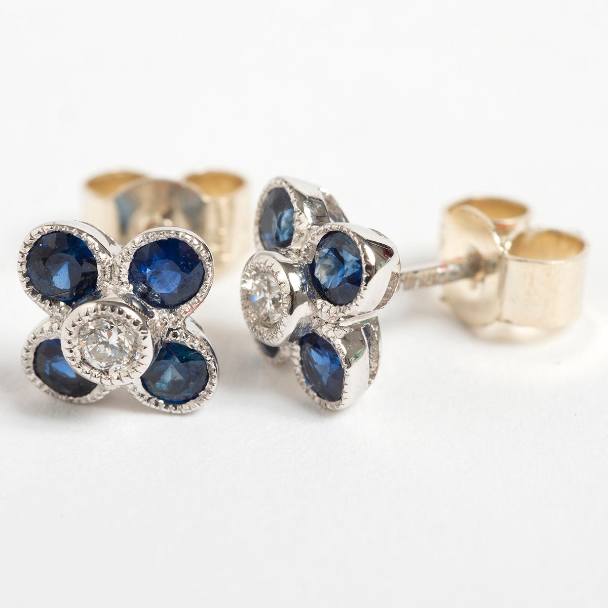 Women's Pretty Petal Shaped Diamond & Sapphire Stud Earrings, .06 carat. For Sale