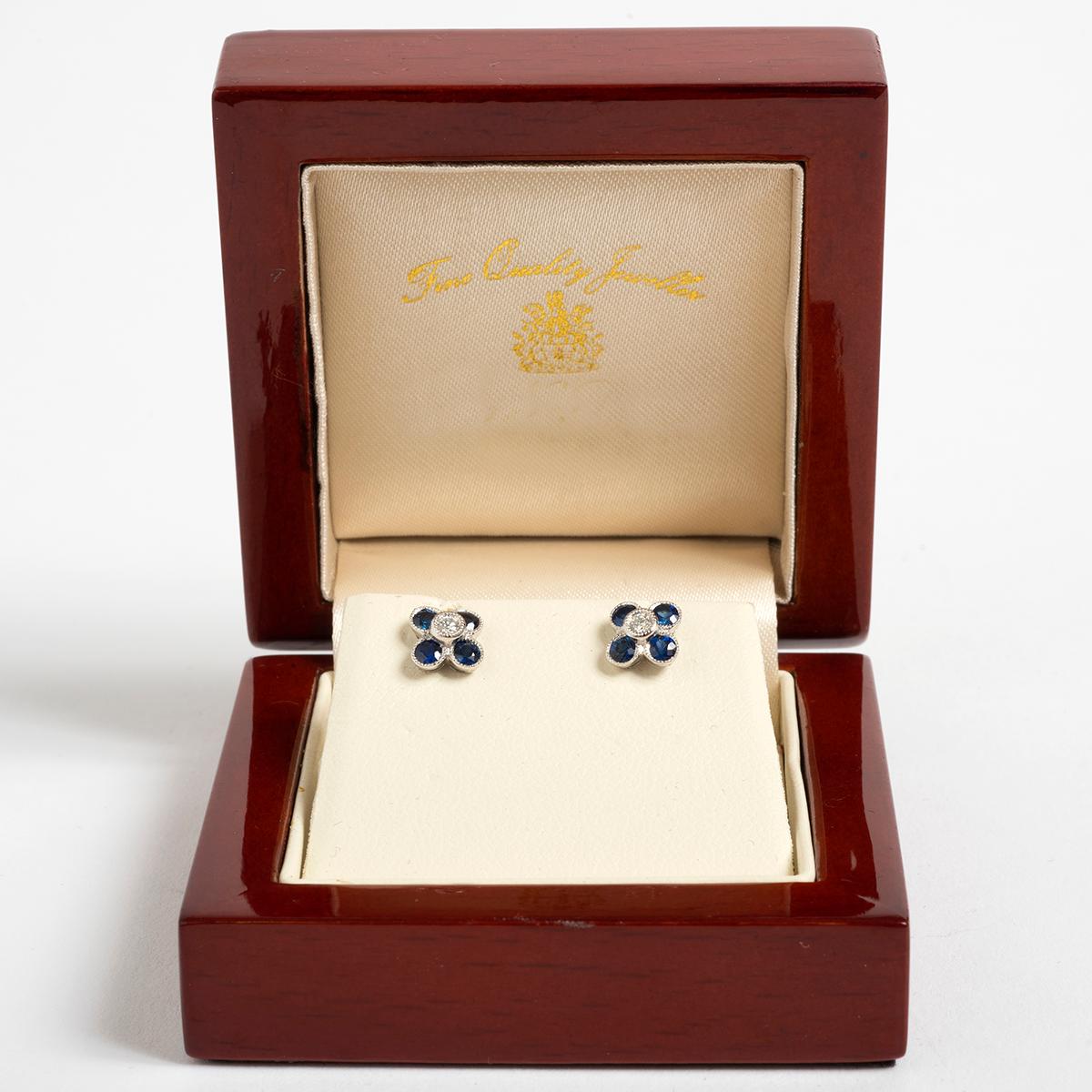 Pretty Petal Shaped Diamond & Sapphire Stud Earrings, .06 carat. For Sale 1