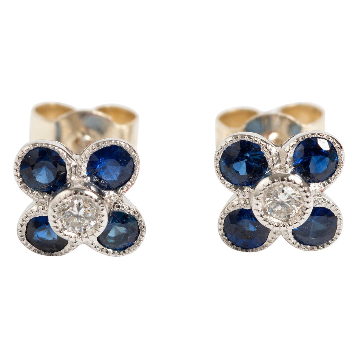 Bonitos pendientes de diamantes y zafiros en forma de pétalo, 0,06 quilates.