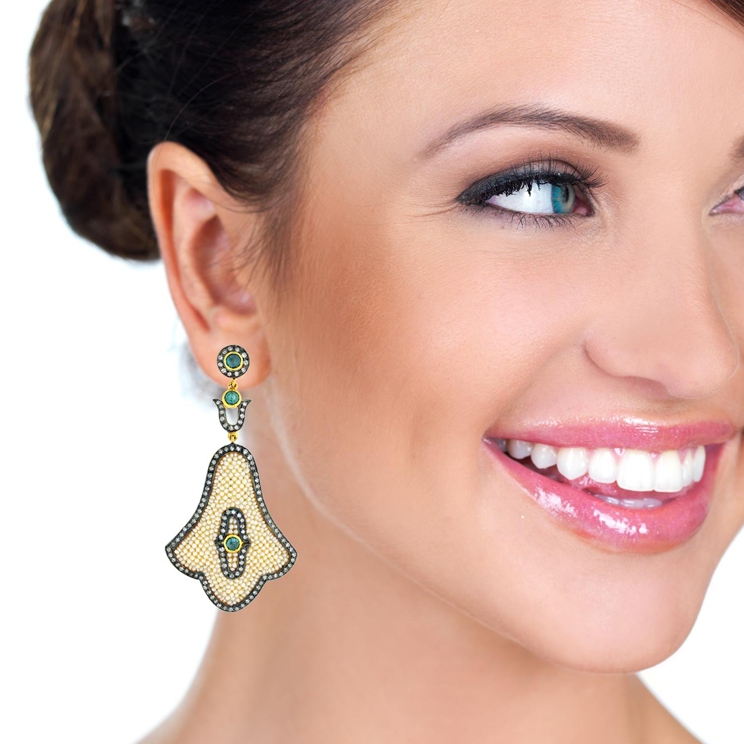 This pretty seed pearl earring with diamonds and blue diamonds in center is made in gold and silver is unique and handmade by finest artisans. 

Closure: Push Post

18K: 1.82g
Diamond: 2.940ct
SiIver: 22.03g
Pearl: 10.30ct,
