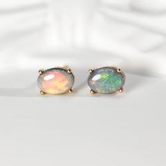 Pretty Simple Oval Australian Black Opal Stud Earrings 14k Yellow Gold
