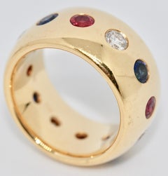 Pretty, Solid 18 Karat Gold Ladies Ring with Diamonds, Sapphires and Rubies