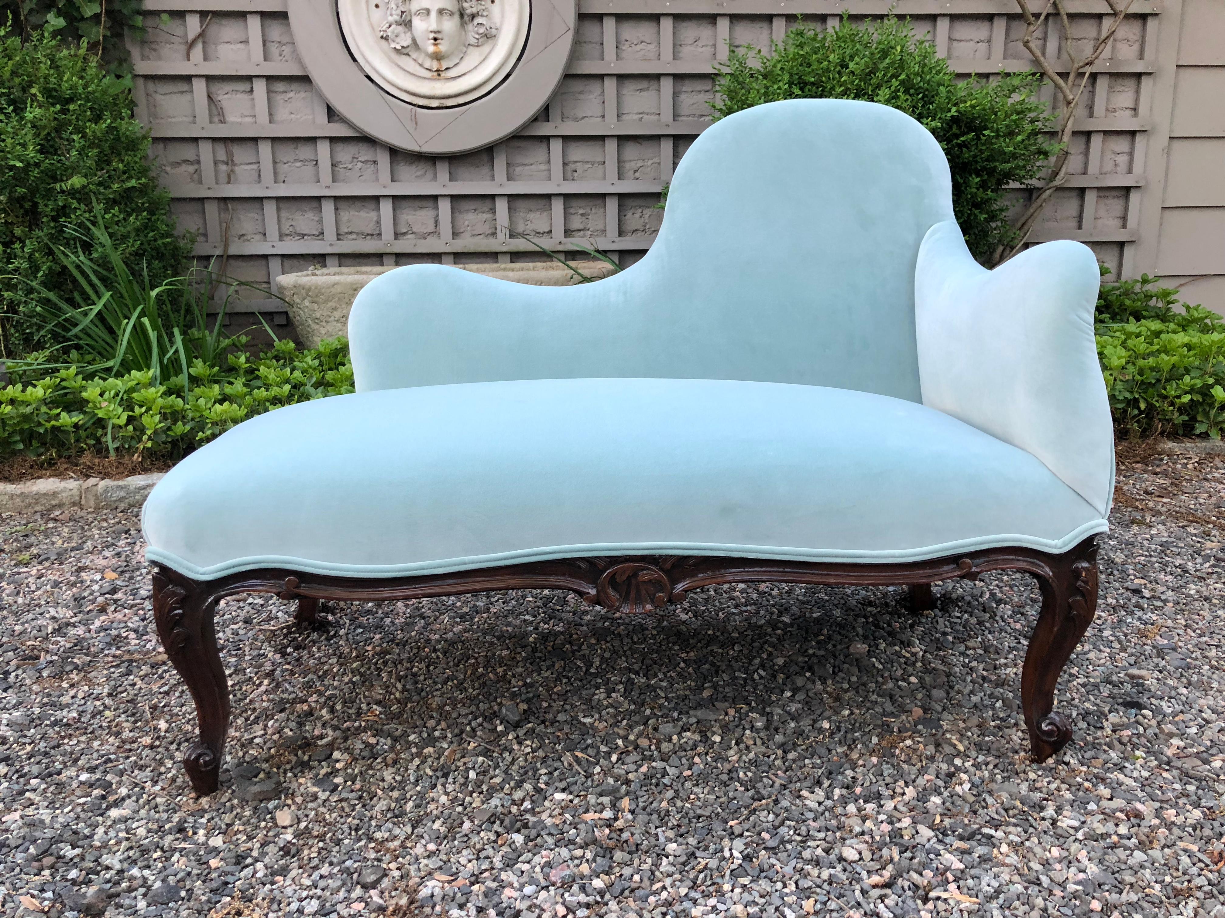 Very pretty vintage settee newly upholstered in a Tiffany blue cotton velvet. Curved back and diminutive size make this perfect for a bedroom or hallway. Measure: Seat height is 16.
