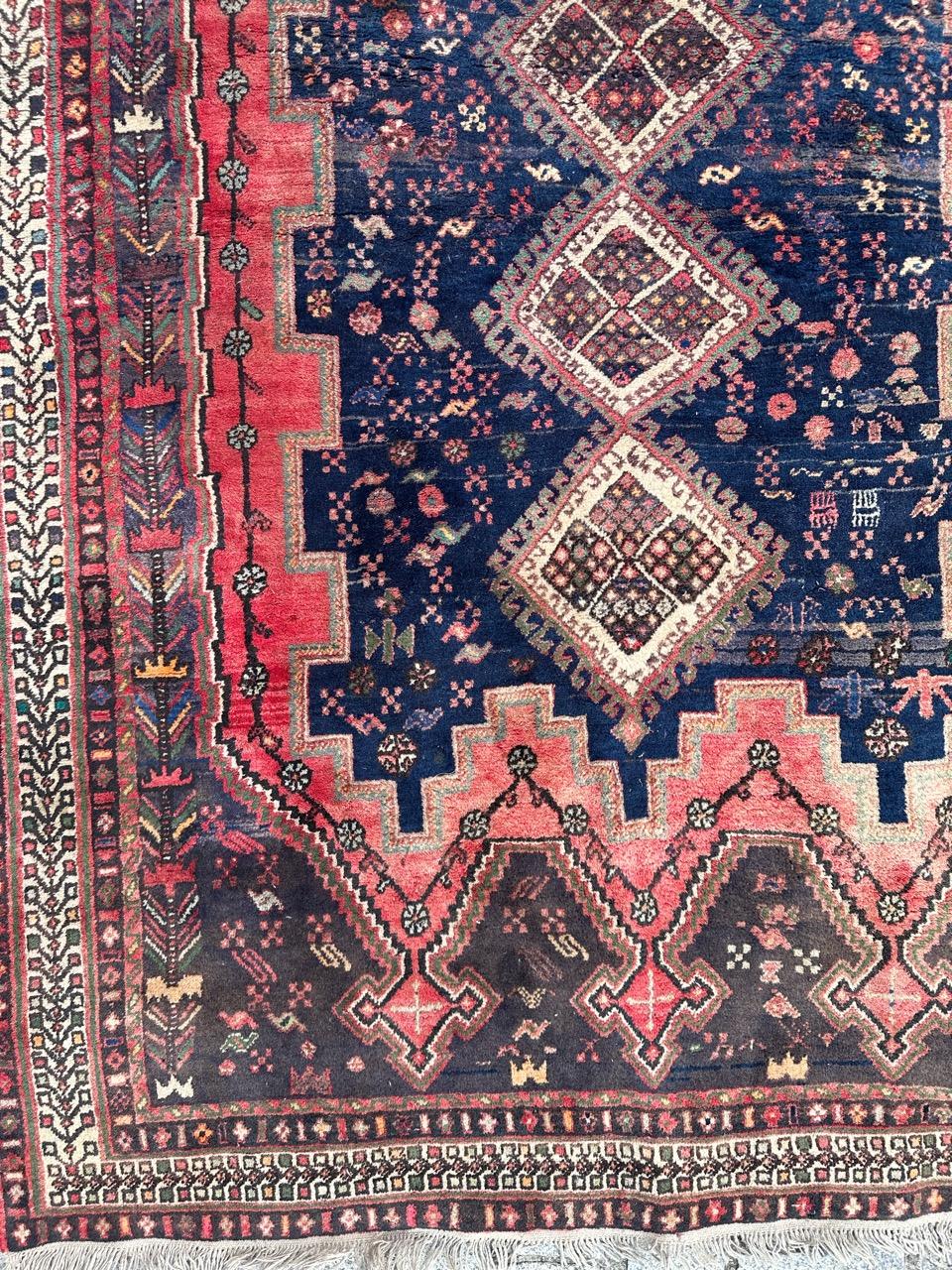 Rustic Bobyrug’s Pretty vintage Afshar rug For Sale