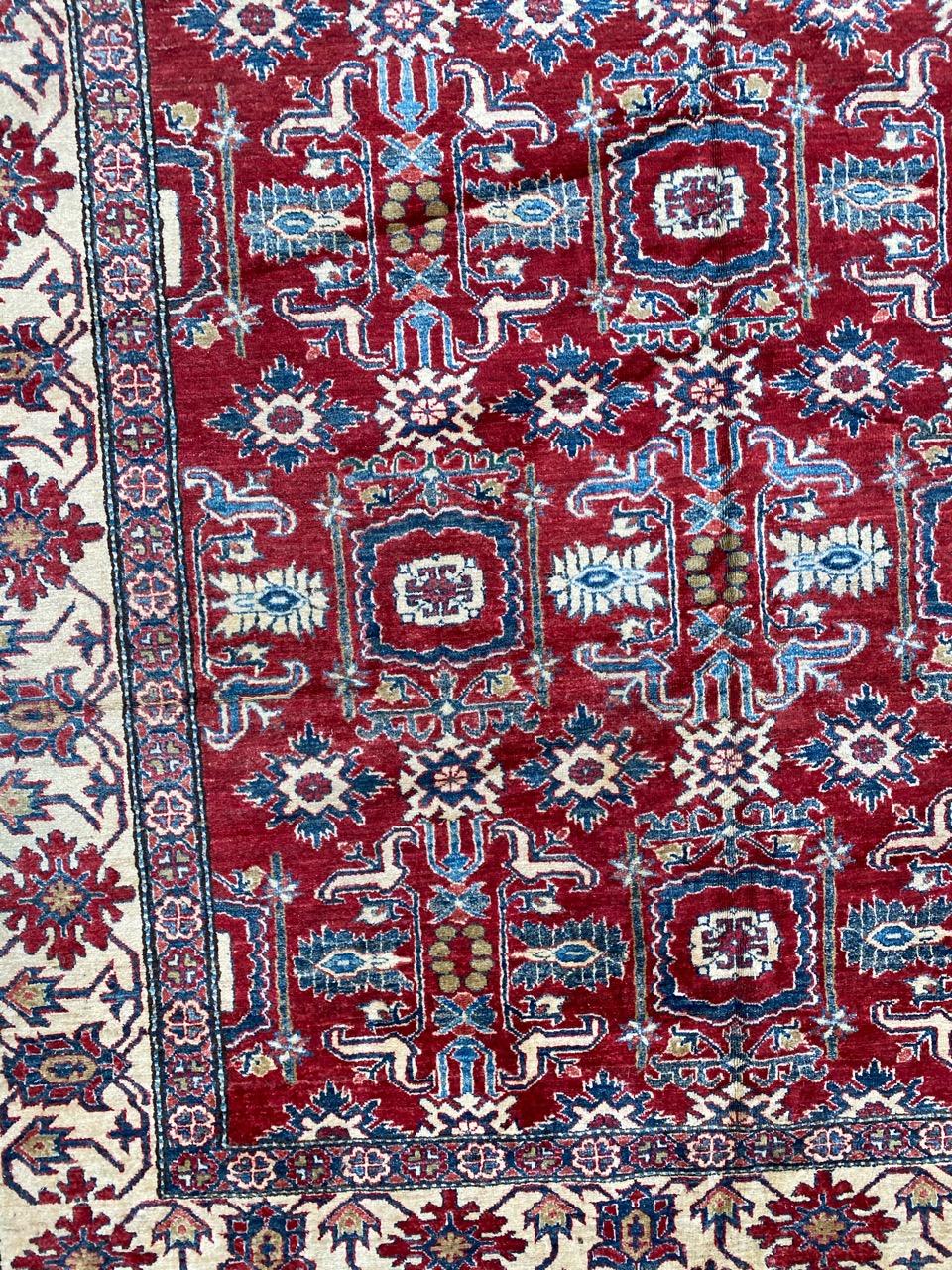 Very beautiful Persian design Afghan rug with nice stylized and decorative design and beautiful colors, entirely hand knotted with wool velvet on cotton foundation.