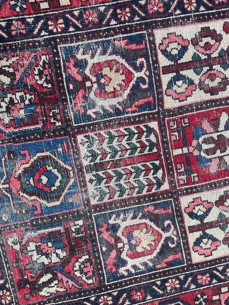 Rustic Bobyrug’s Pretty vintage distressed Bakhtiar rug  For Sale