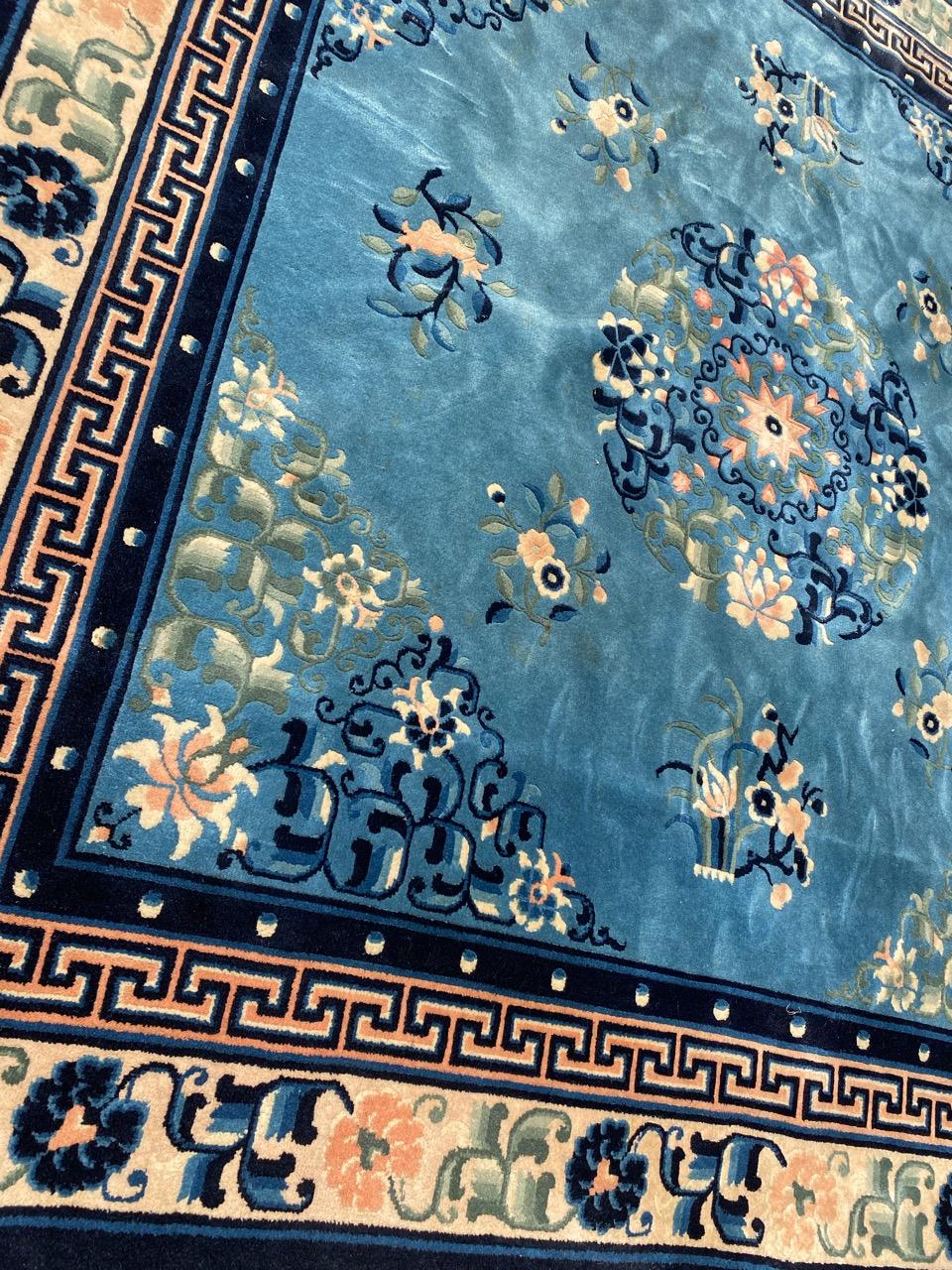 Very beautiful square Chinese Beijing rug with nice Chinese design and beautiful colors with blue, entirely hand knotted with wool velvet on cotton foundation.