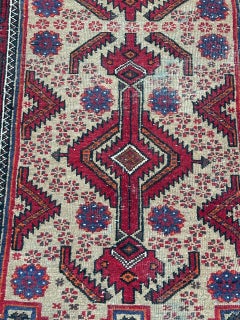 Pretty vintage tribal Baluch rug