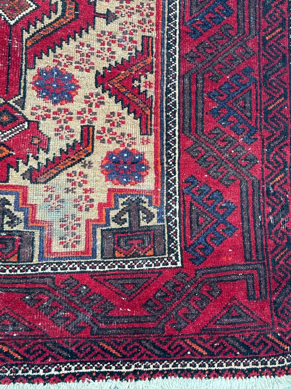 Hand-Knotted Pretty vintage tribal Baluch rug For Sale