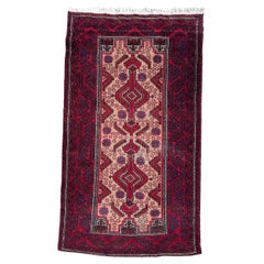 Pretty vintage tribal Baluch rug