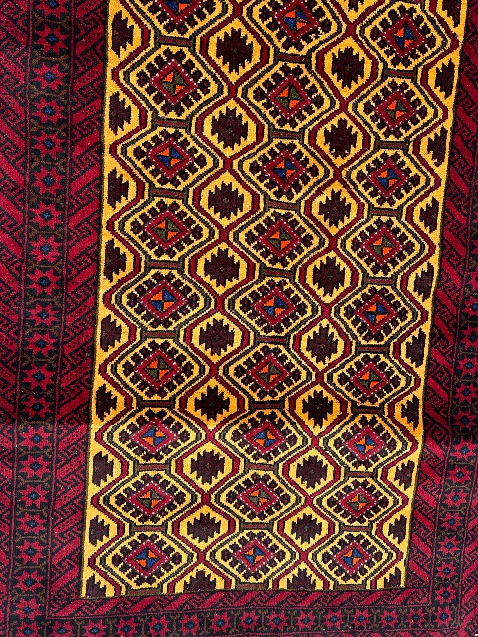 Late 20th Century Pretty vintage Turkmen Baluch rug For Sale