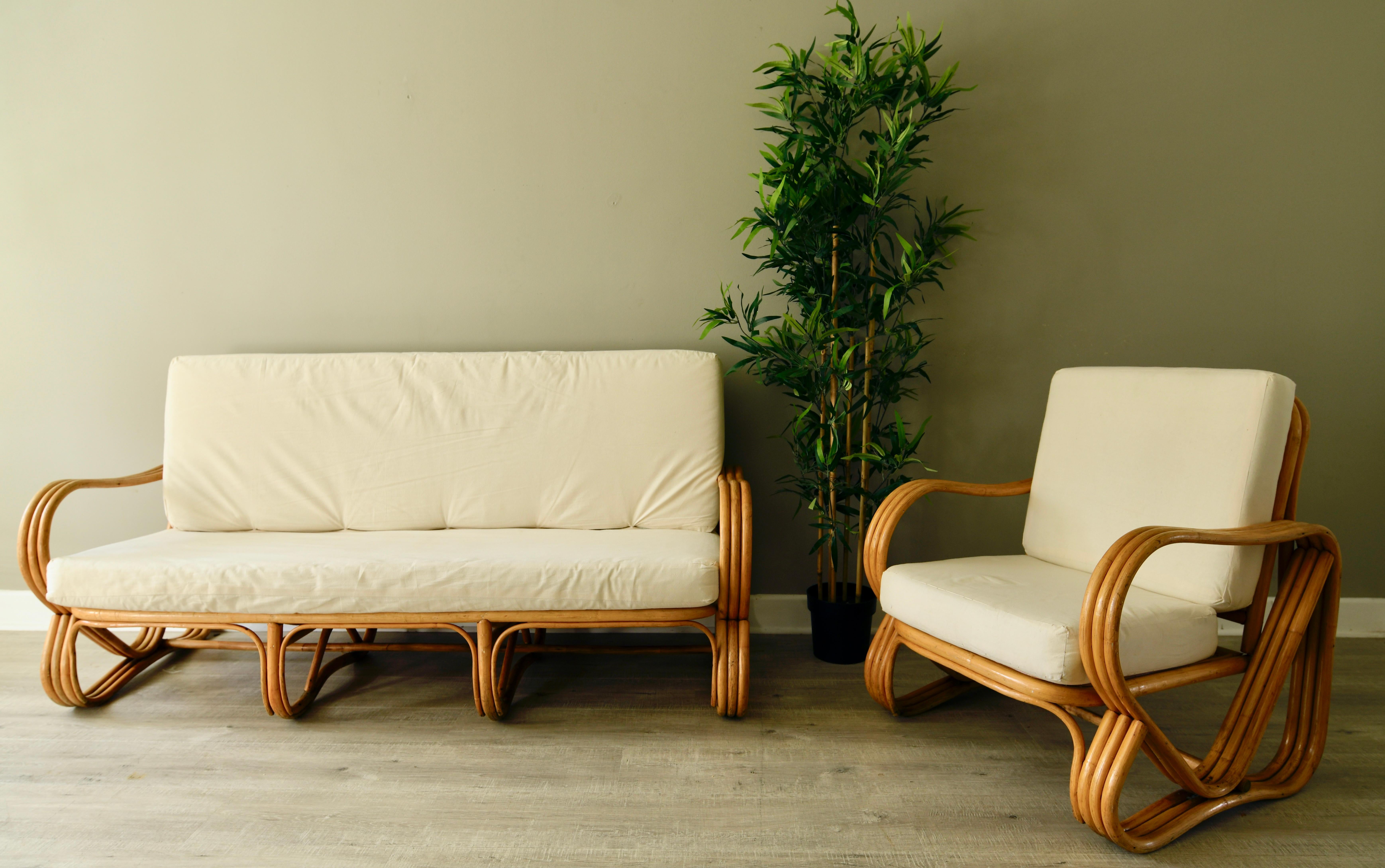 Vintage pretzel bamboo sofa, Paul Frankl Ficks Reed in style 
It's a sculptured frame and the armrests are shaped for sheer comfort cleaned and polished but we've retained the amazing patination to the bamboo.

Dimensions:

Three strand