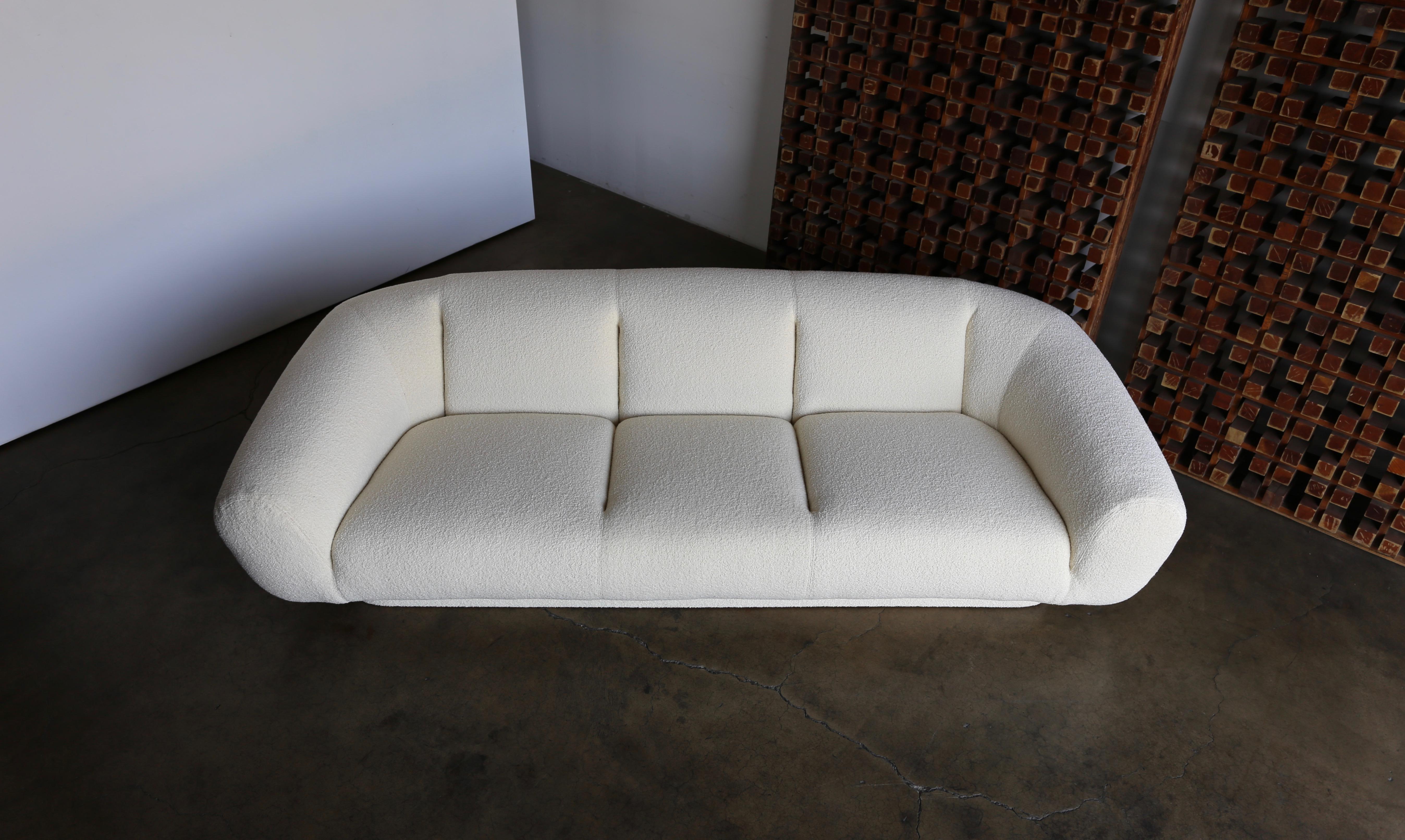Preview Furniture Company sofa, circa 1975. This piece has been professionally restored in Holly Hunt bouclé.

(Often attributed to Steve Chase).
