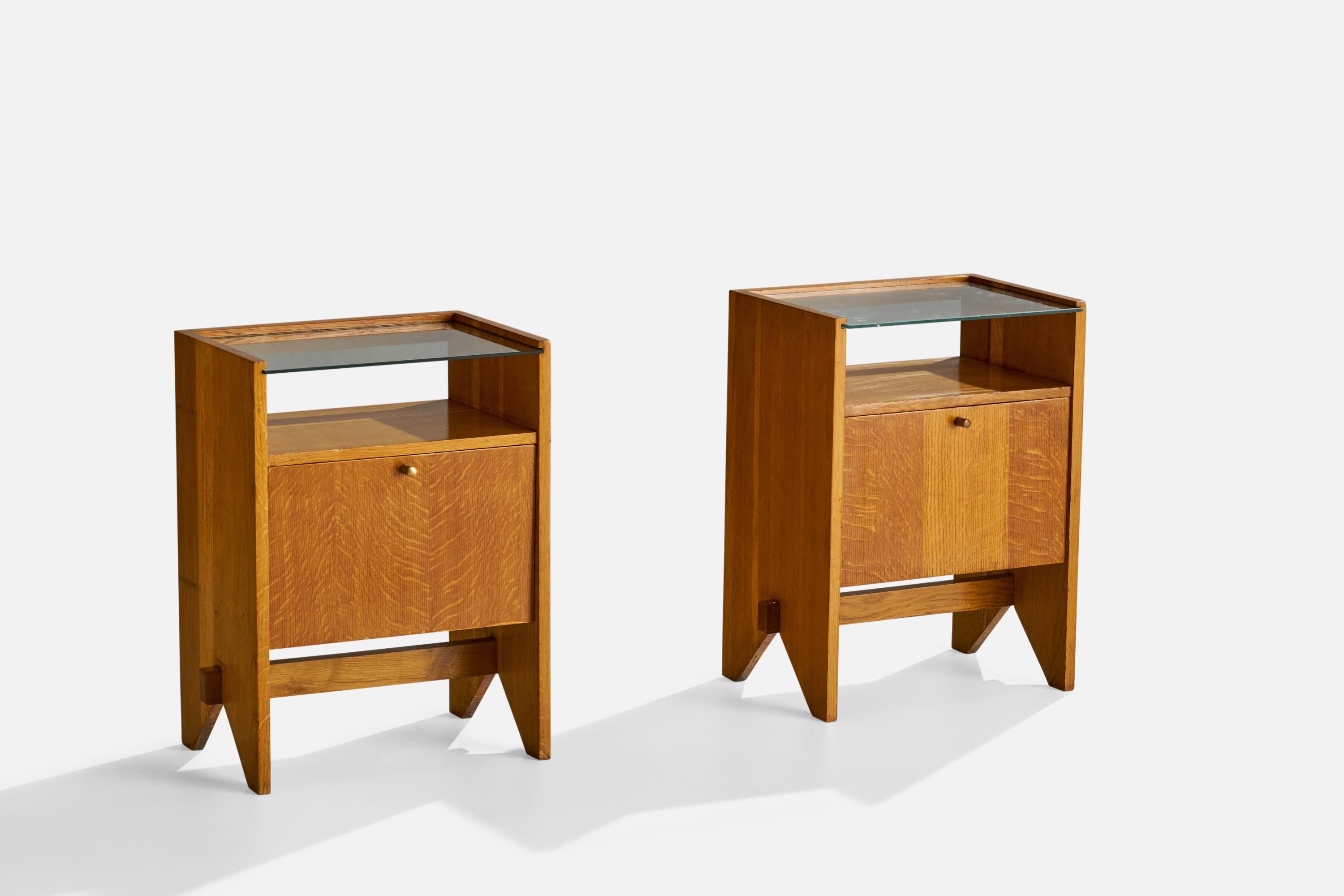 A pair of wood, glass and brass nightstands designed and produced by ISA Bergamo, Italy, c. 1950s.