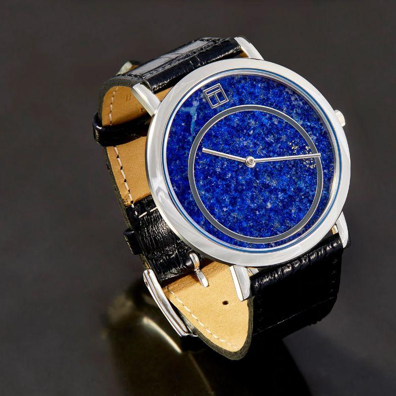 Prezioso watch with lapis, black Italian leather and stainless steel

Featuring a dial made solely of natural lapis semi-precious stone, skilfully cut and highly polished to create a smooth mirror finish. A concentric raised steel circle creates a