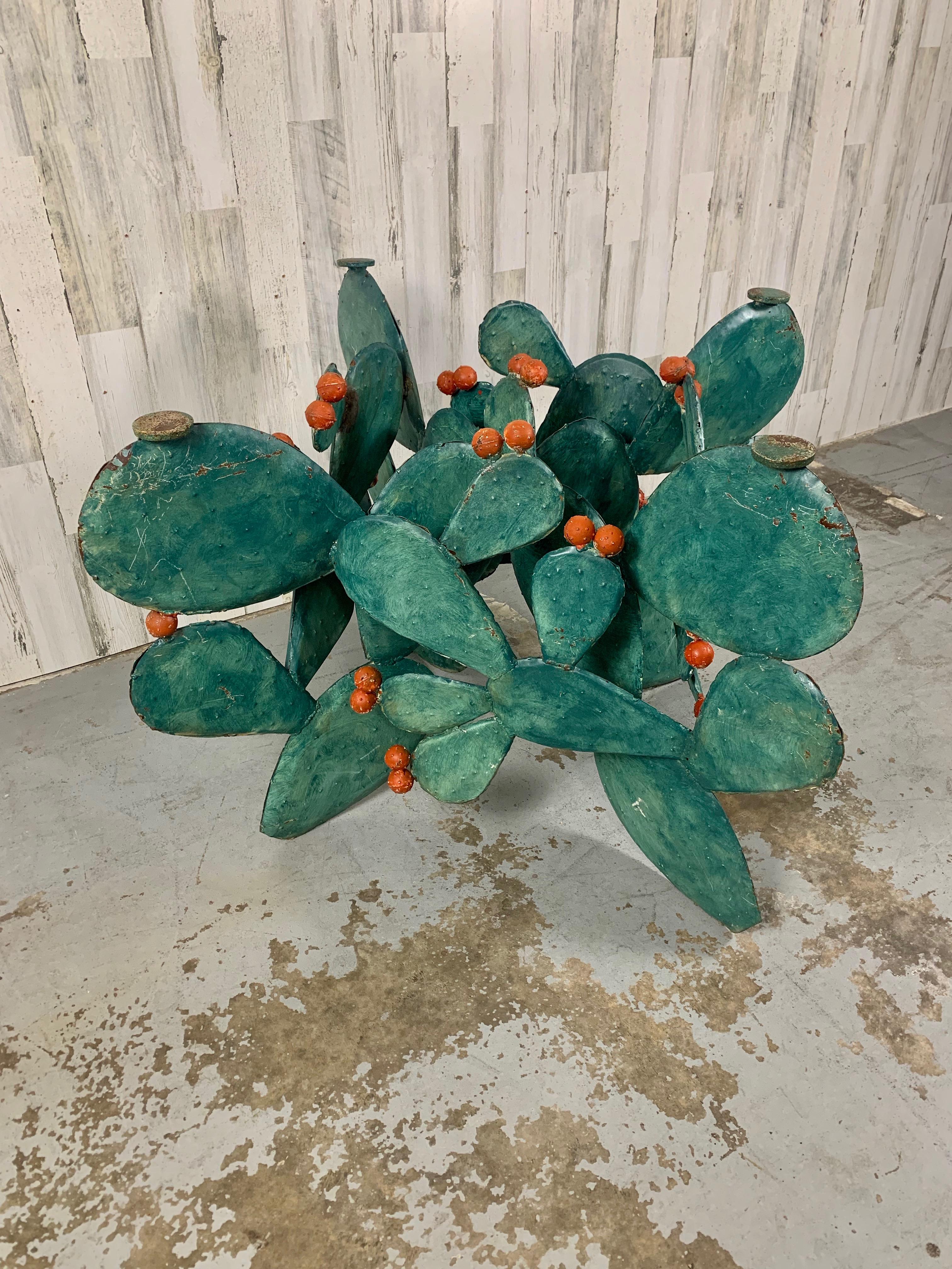 Metal Prickly pear cactus sculpture / table base is stunning in it's presence, very artistic in the design for this table base. original finish with normal wear for its age.