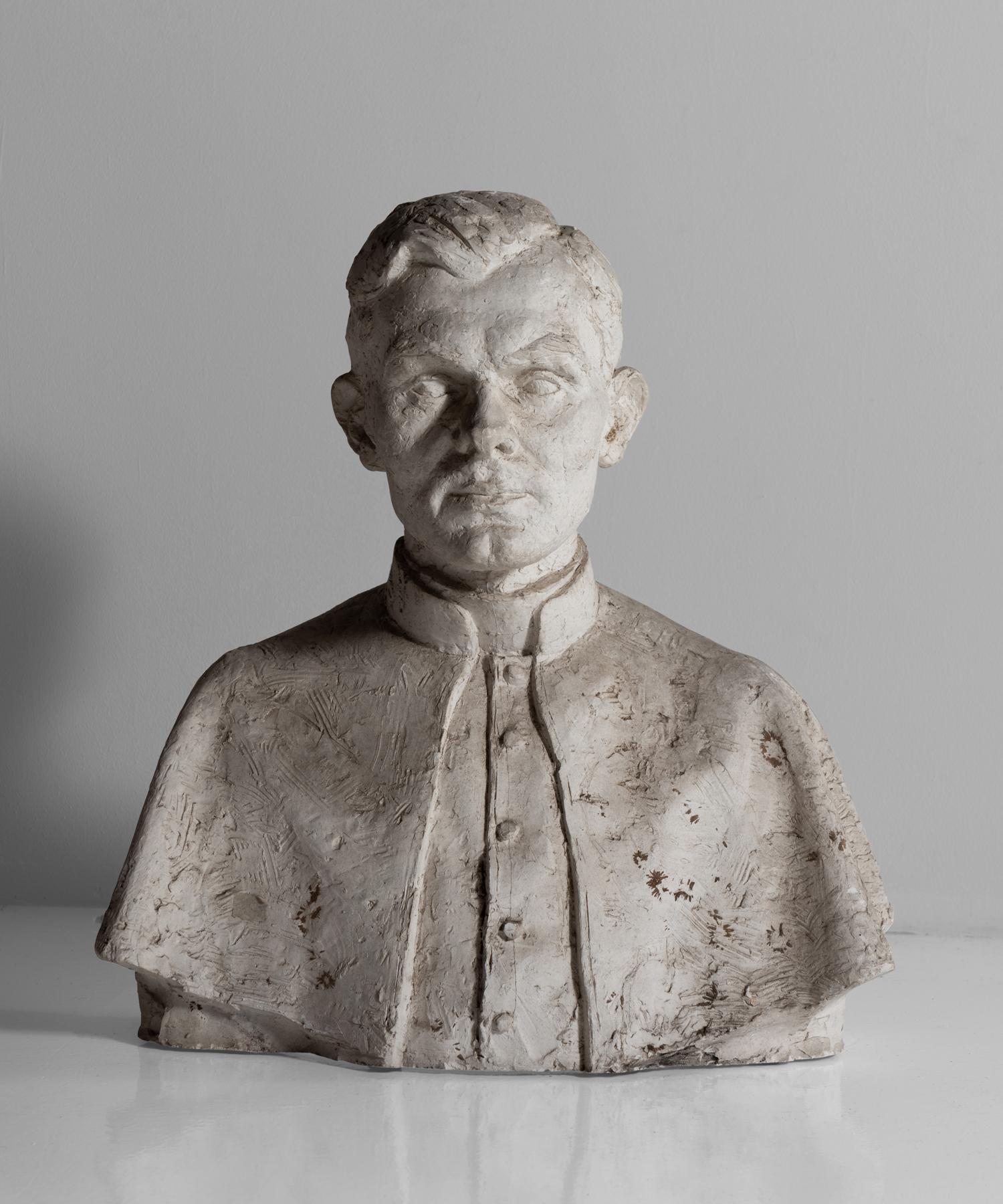 Bust of a young priest with great detail.

   