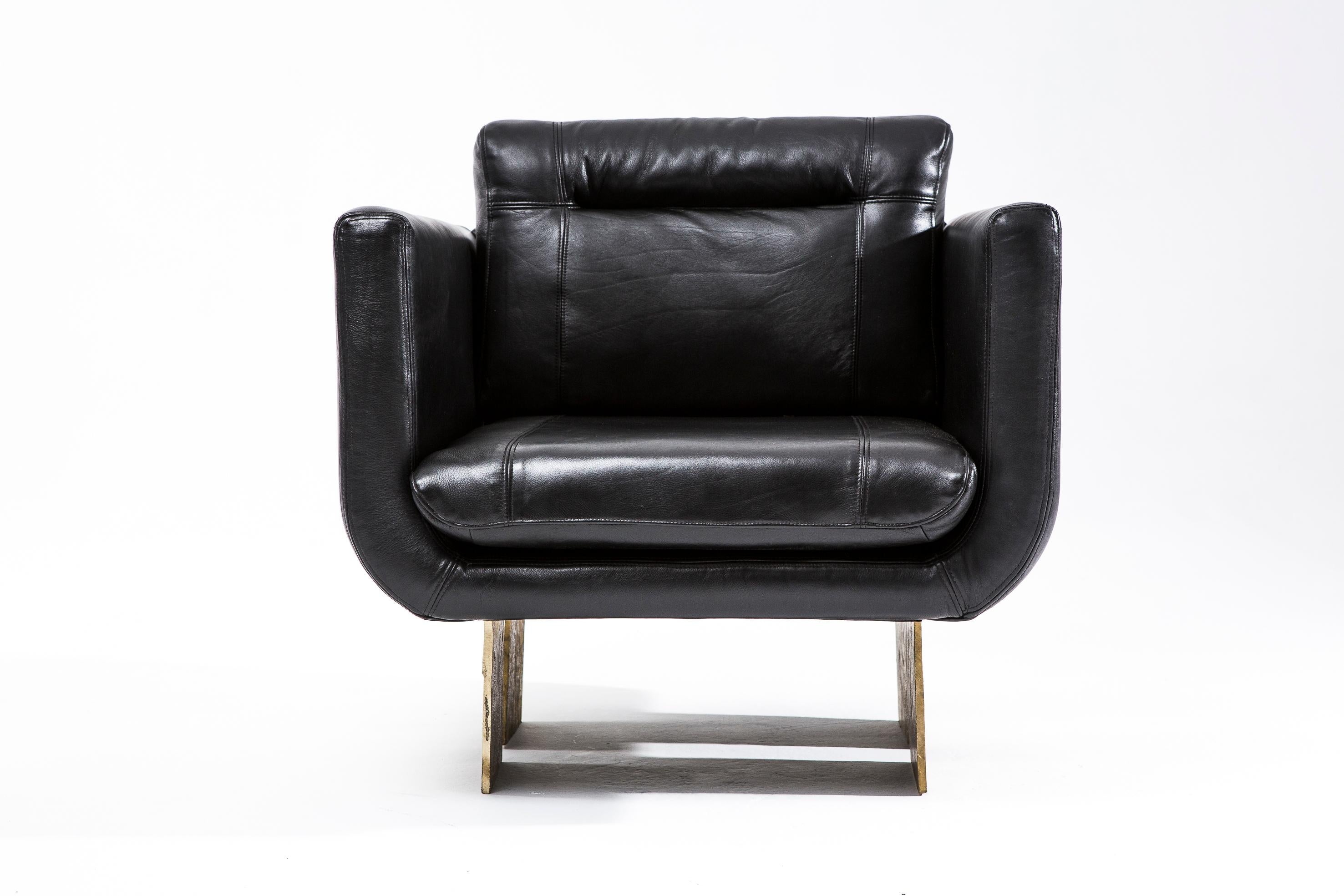 Primal Lounge Chair by Egg Designs
Dimensions: 80 L X 80 W X 80 H cm
Materials: Solid Cast Brass, Black Leather Upholstery

Founded by South Africans and life partners, Greg and Roche Dry - Egg is a unique perspective in contemporary furniture