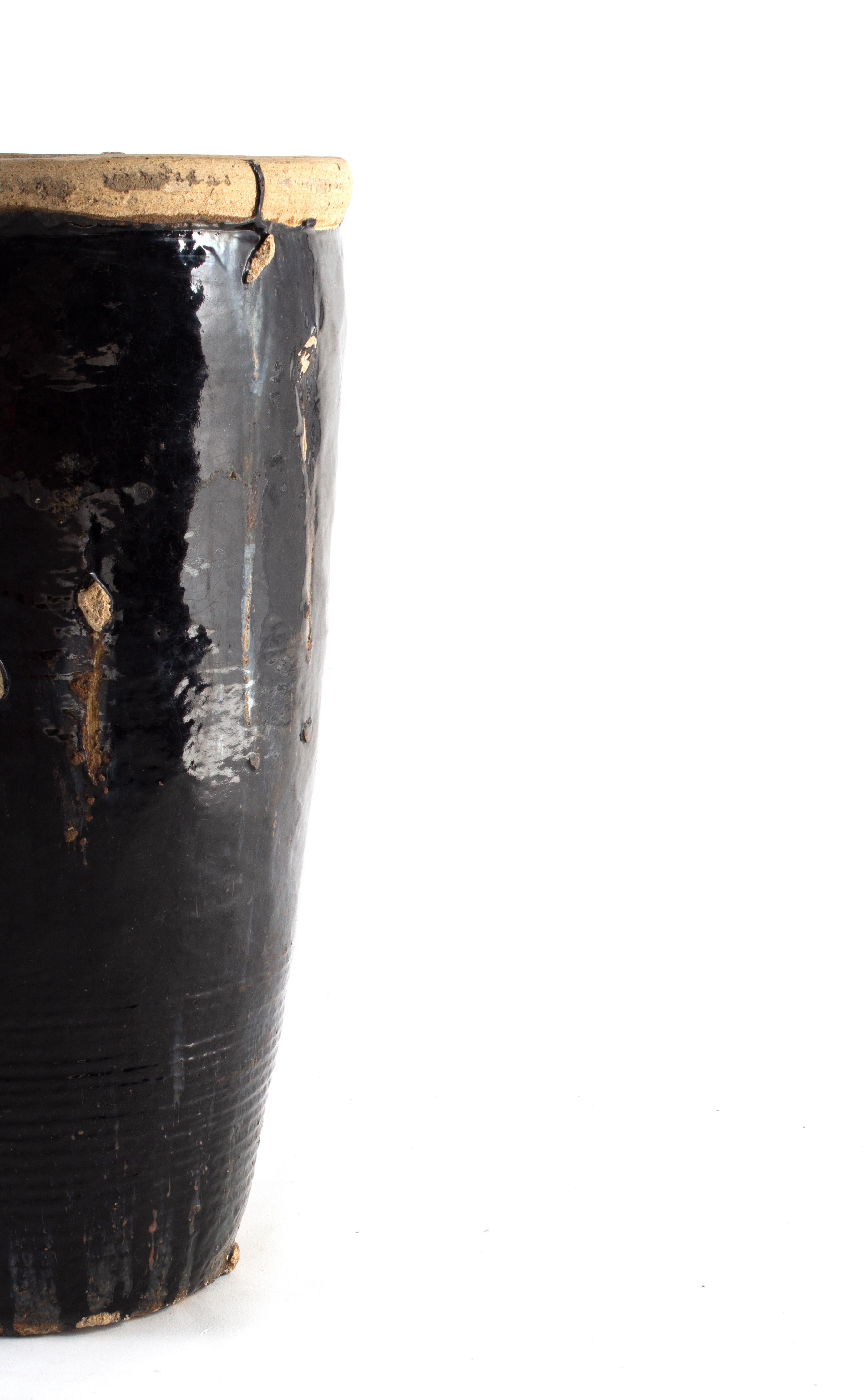 Primative ebony glazed terracotta jar.

This piece is a part of Brendan Bass’s one-of-a-kind collection, Le Monde. French for “The World”, the Le Monde collection is made up of rare and hard to find pieces curated by Brendan from estate sales,