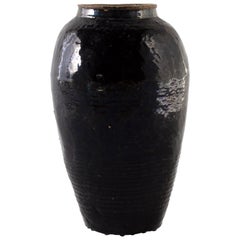 Primative Ebony Glazed Tarracotta Jar