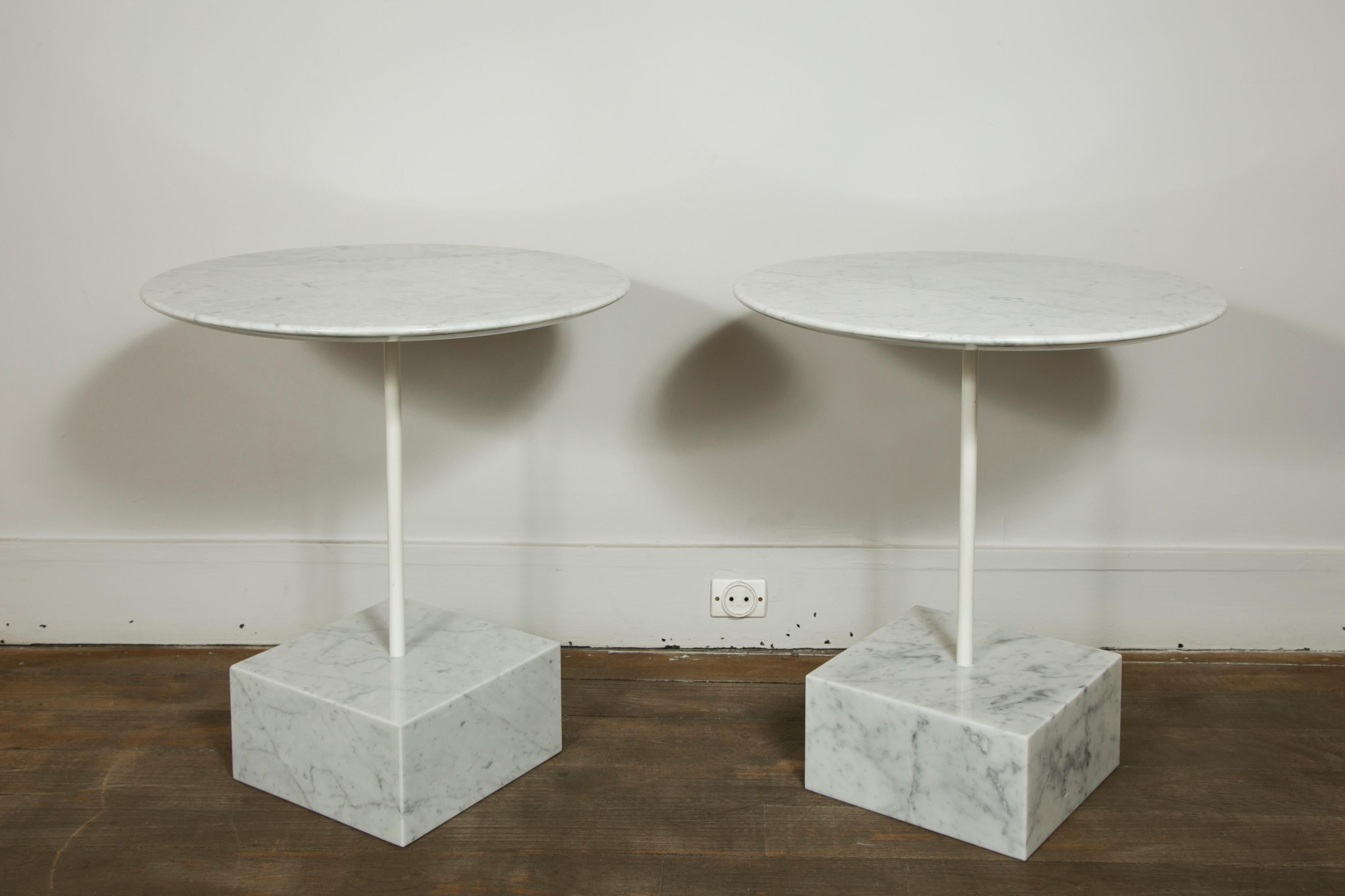 A white veneered marble gueridon.
Marble base and top, metal stem.

Designed by Ettore Sottsass.
Edited by Ultima Edizione, 

Italy, 1990.

 ( please note the item is the piece on the right of the main photo ) 