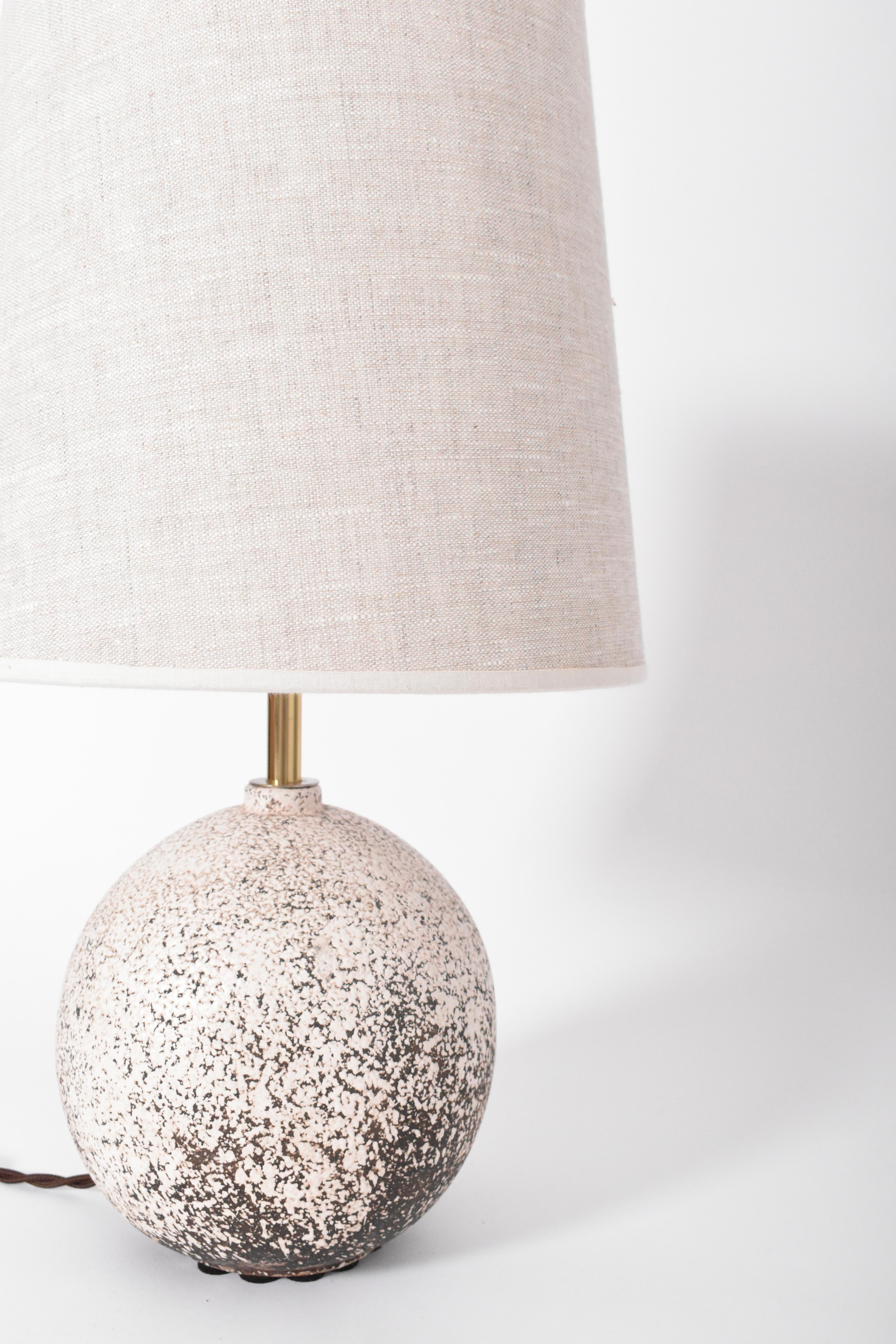 Primavera style ball lamp with a brown and cream pattern. France, 1940s.