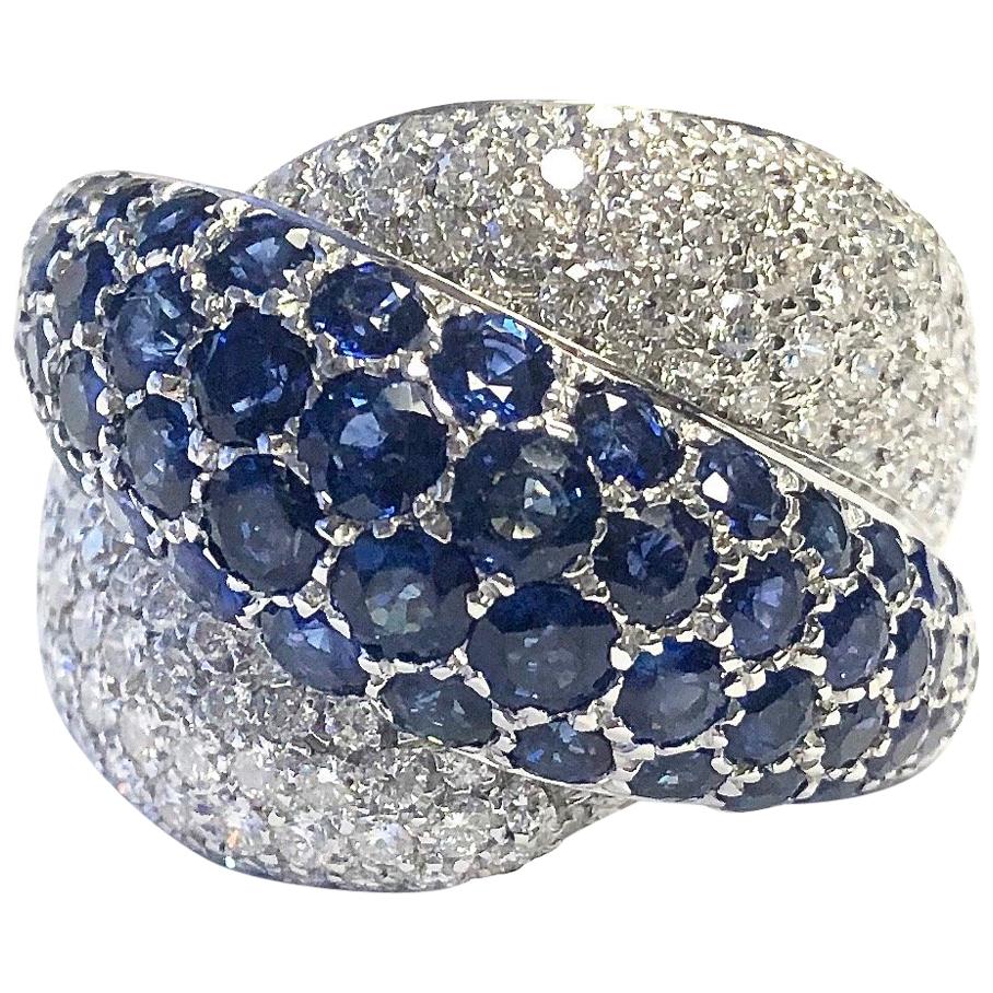 Primera Pave Set Sapphire and Diamond Crossover Ring For Sale