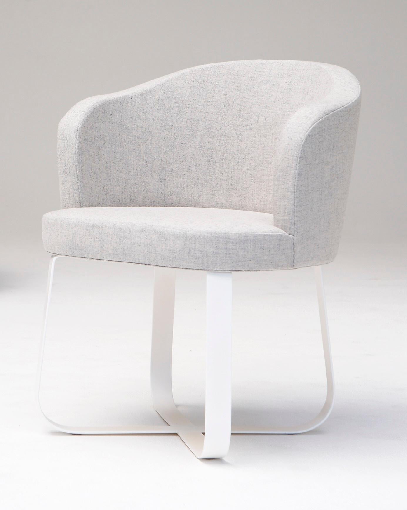 Primi Personal Chair by Phase Design
Dimensions: D 60.3 x W 62.2 x H 76.2 cm. 
Materials: Powder-coated steel and upholstery.

Solid steel flat bar available in a flat black or white powder coat or polished chrome finish with upholstered top. Powder