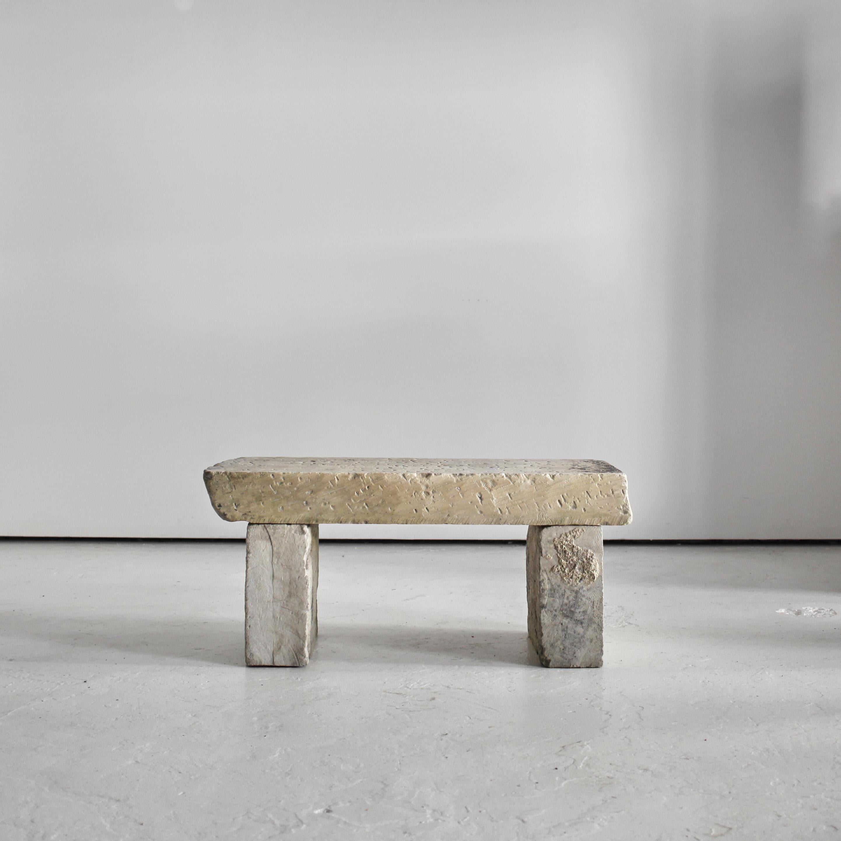 A French primitively carved “tuffeau” stone bench from the Loire valley.

Constructed simply from three thick slabs of local Loire stone.