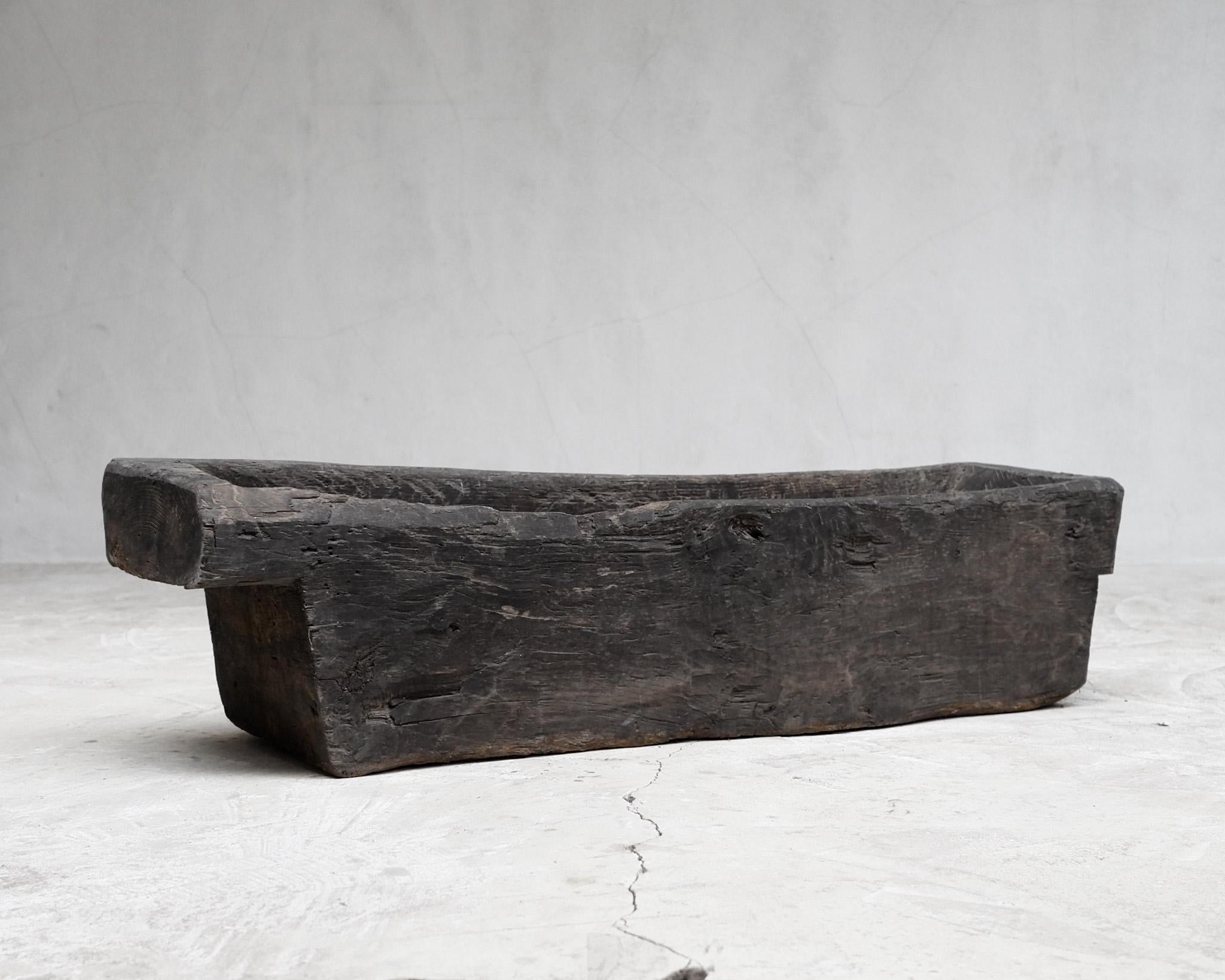 A good size, chunky, early 19th C. primitive dug-out planter.

Beautiful colour/wear.

Most likely originally used as a trough - now perfect as a planter.

-

We offer free shipping to the USA/Canada through Fedex with this item.