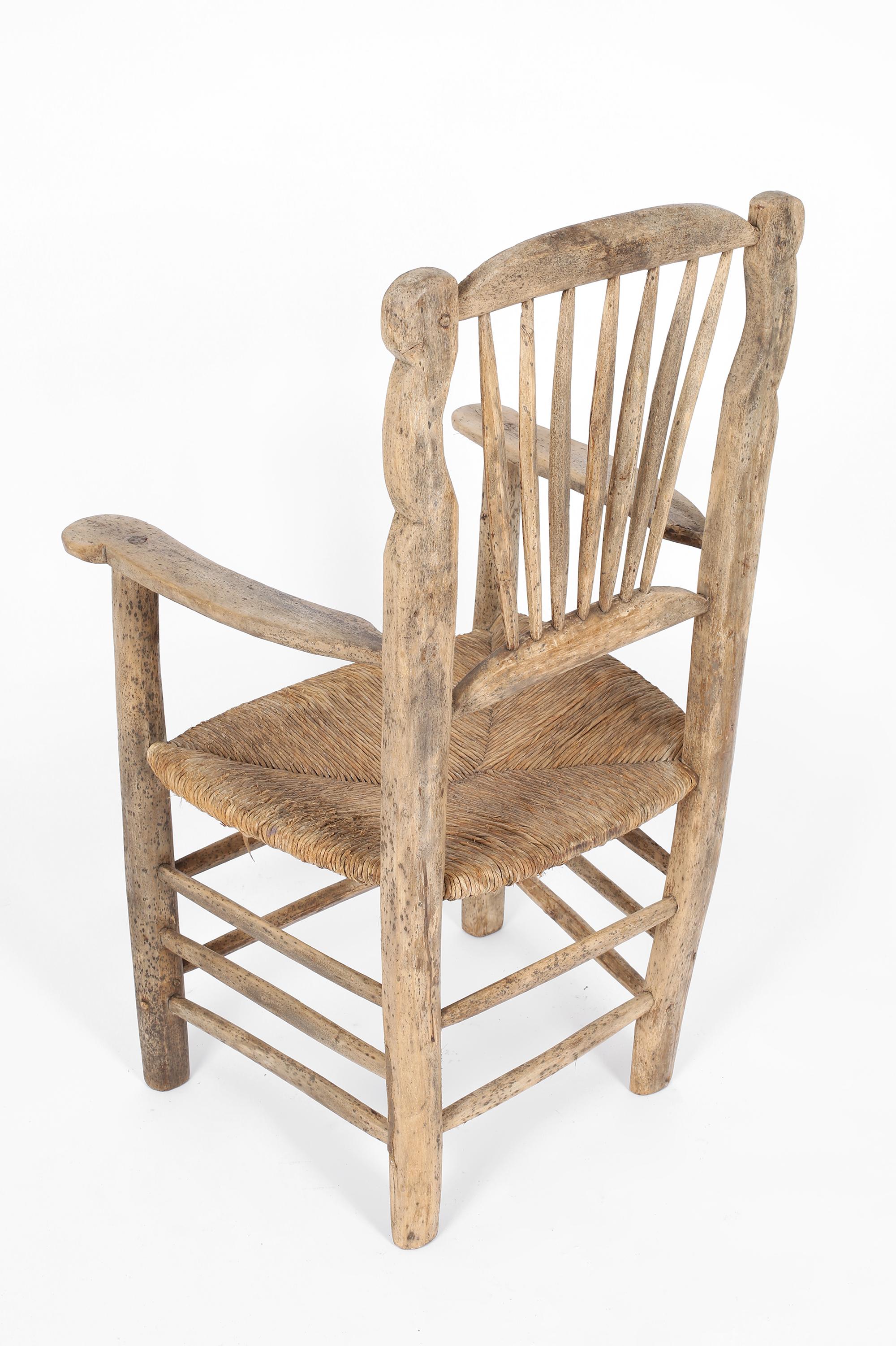Woven Primitive 19th Century Elm & Rush Chair For Sale