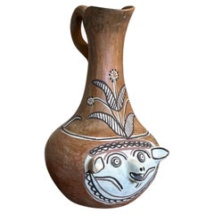 Primitive Animal Face Jug Clay pottery Folk art Head pitcher Sculpture.