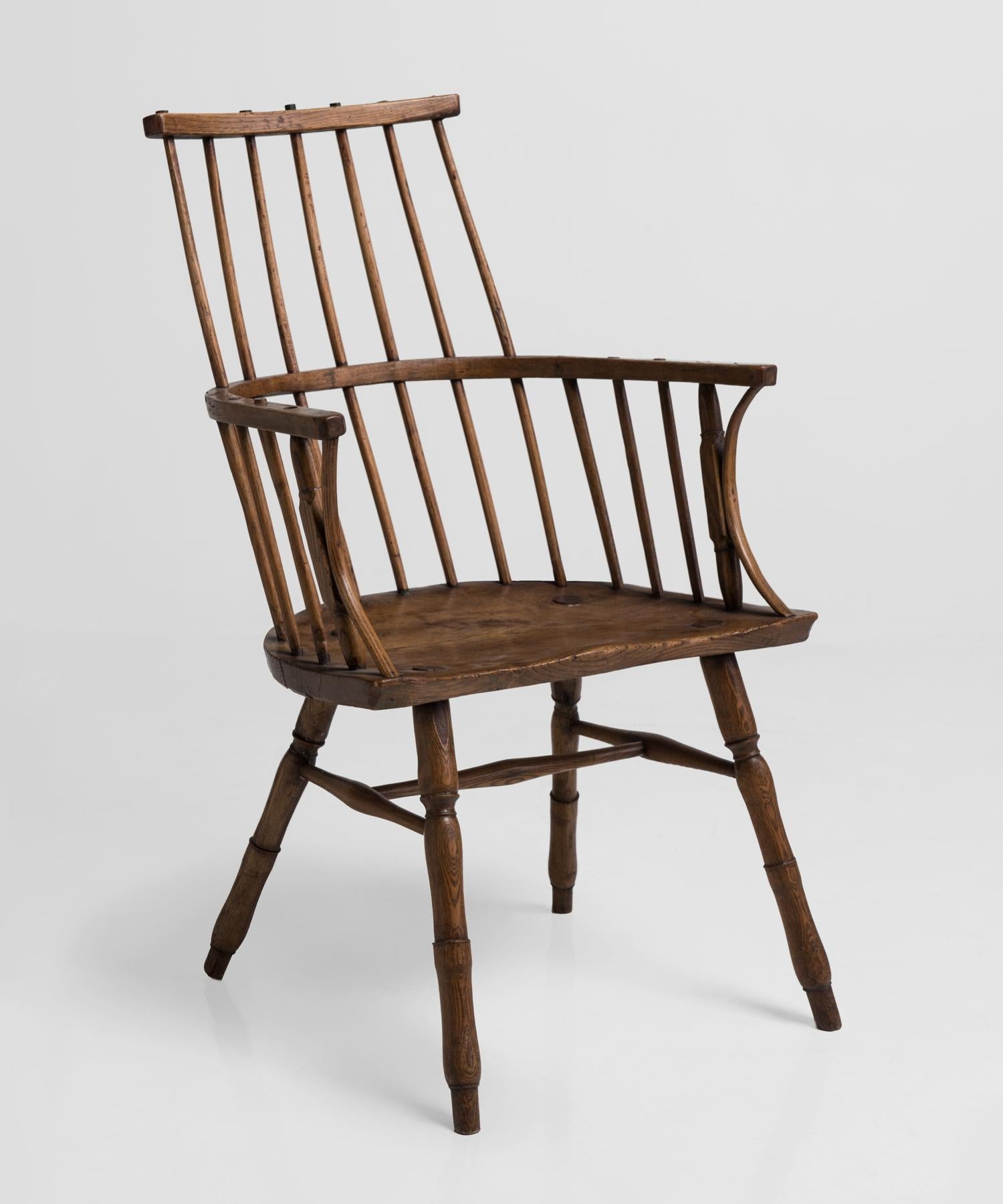 Primitive ash stick chair, England, 18th century.

Handcrafted Windsor chair with slab seat.