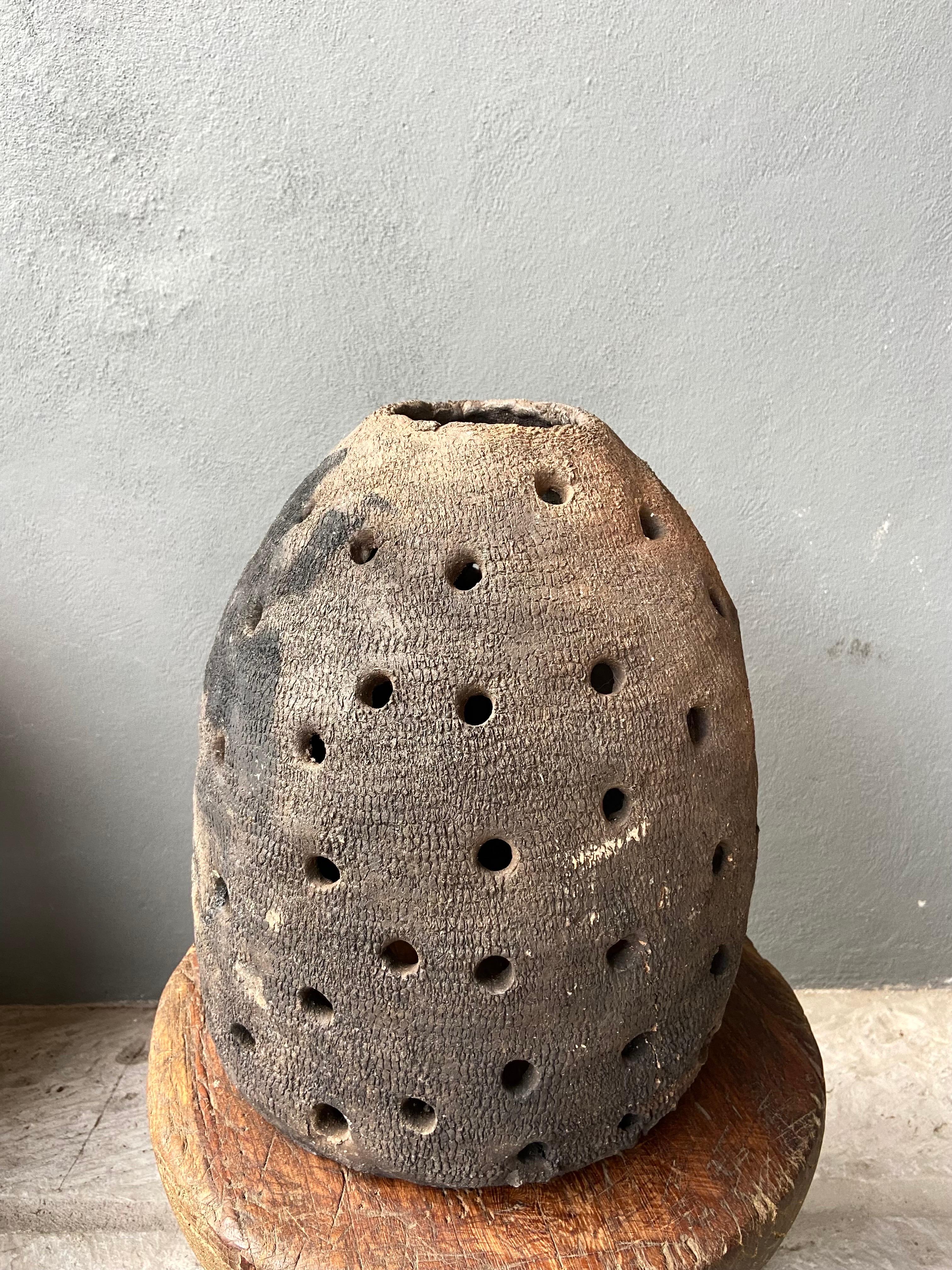 Primitive terracotta charcoal burner from the northern Sierra of Puebla,, Mexico, circa 1950´s. Shows considerable wear in coloration and texture. A rare find.