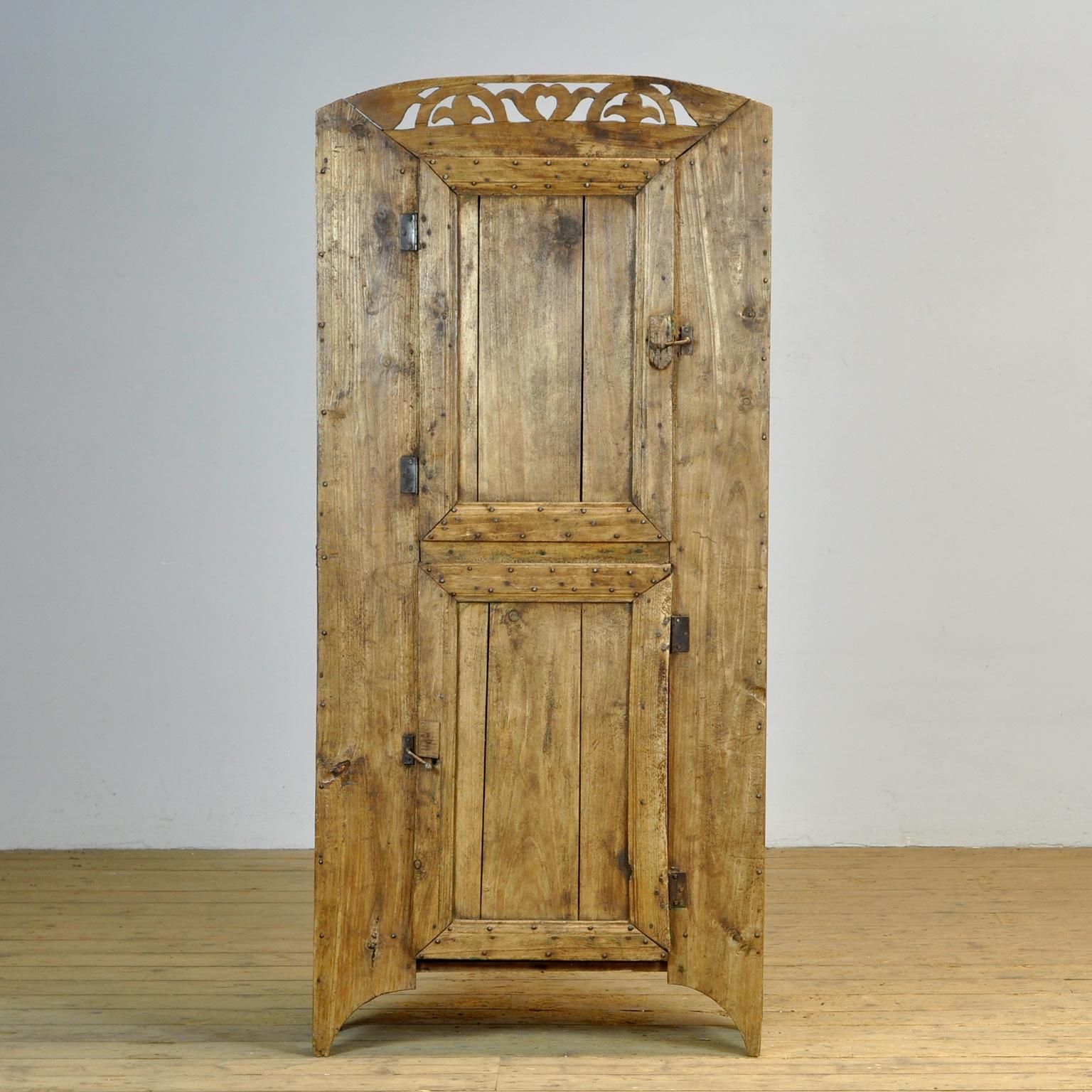 Rare primitively made cupboard, Carpathians, circa 1850, early construction, constructed from sawn or hewn beech wood. The cabinet consists of two compartments. The doors open to the left and right. A nice detail are the nails that have been used.
