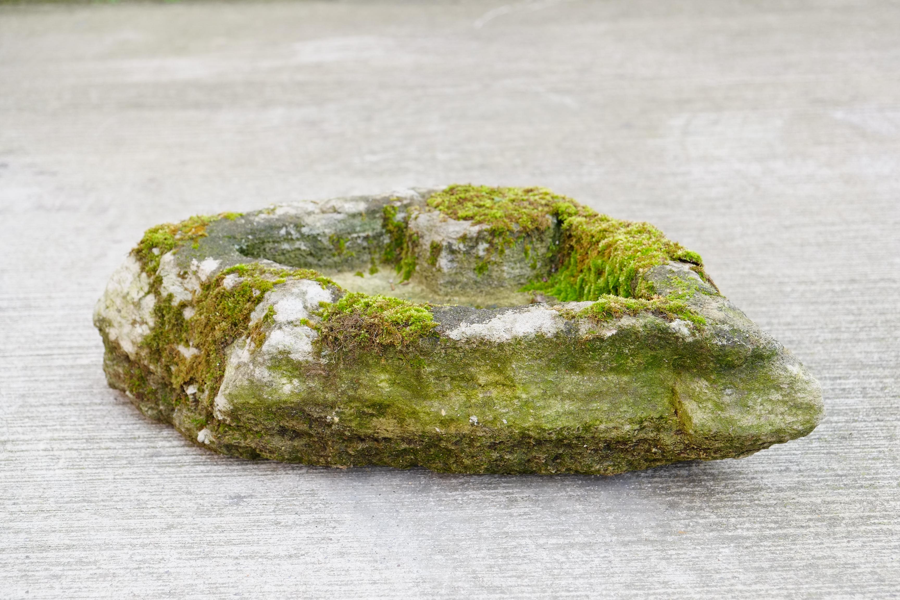The most beautiful hand carved stone trough. Organic shape from the natural stone, with a shallow planter space which has been hand carved. This trough has the perfect level of patina and growth - I will store this piece outside to retain the moss,