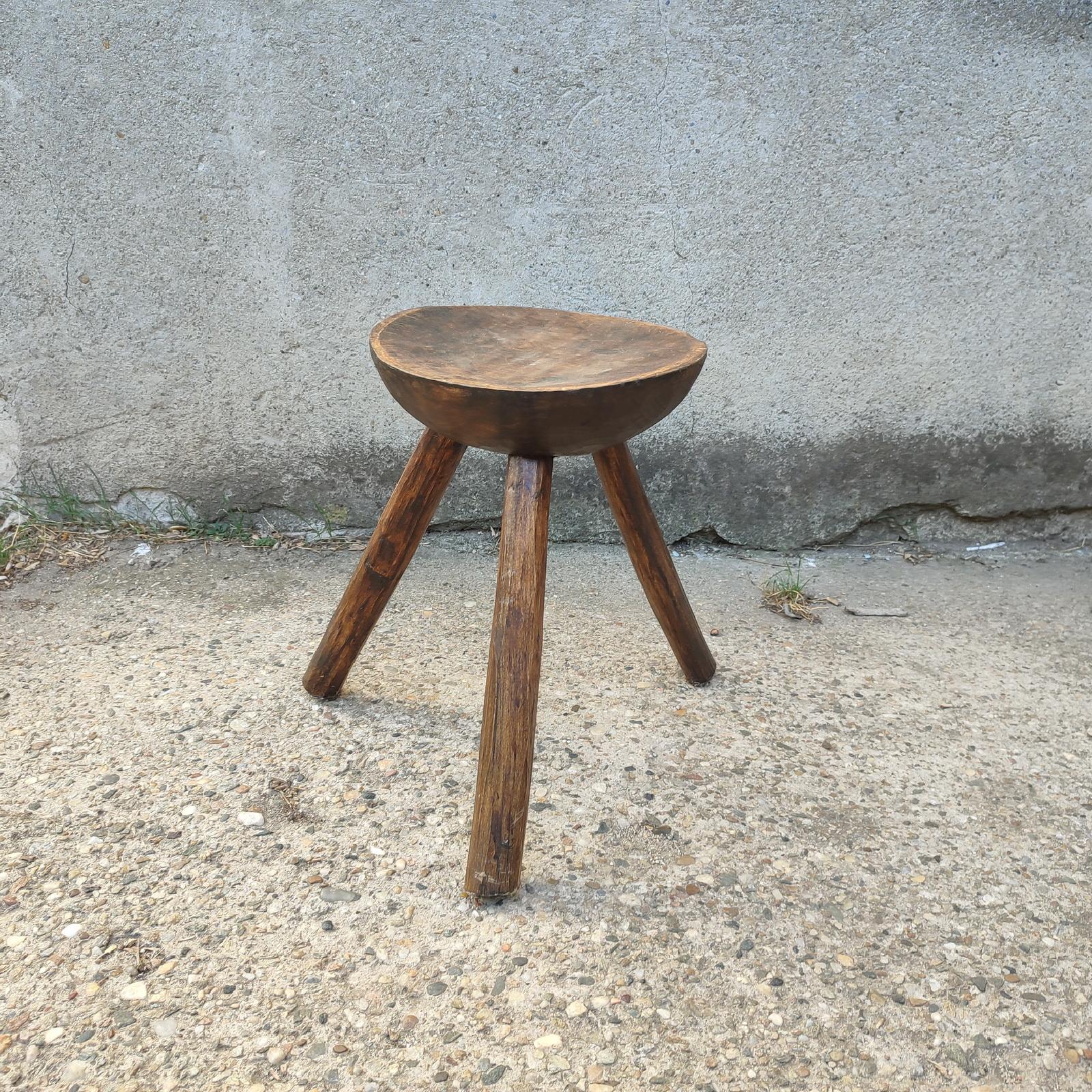 This primitive milking splayed leg wood stool was made circa 1920. The seat is beautifully hand carved out of one single piece.
It has this fabulous Wabi Sabi look and beautiful patina. It is in its original condition.
Measures: Seat diameter ca