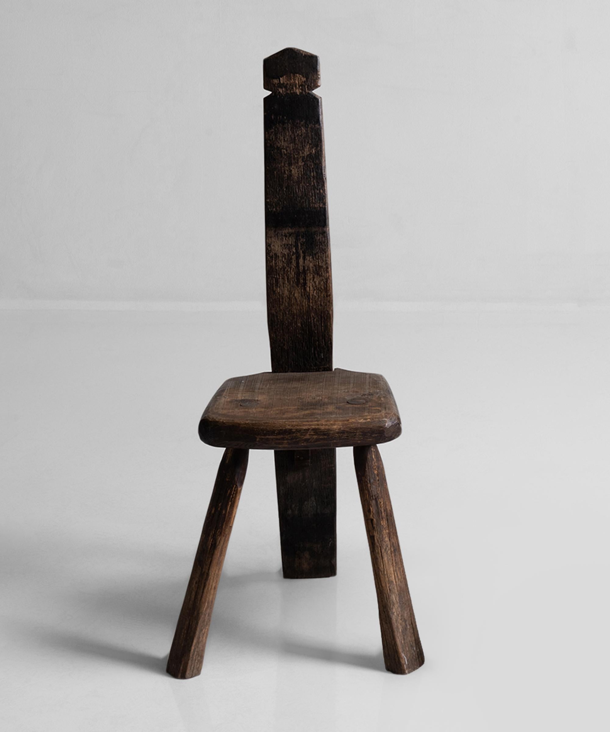 Constructed in oak. Unique form, slab seat with peg legs and curved carved wooden back.


Measures: 14