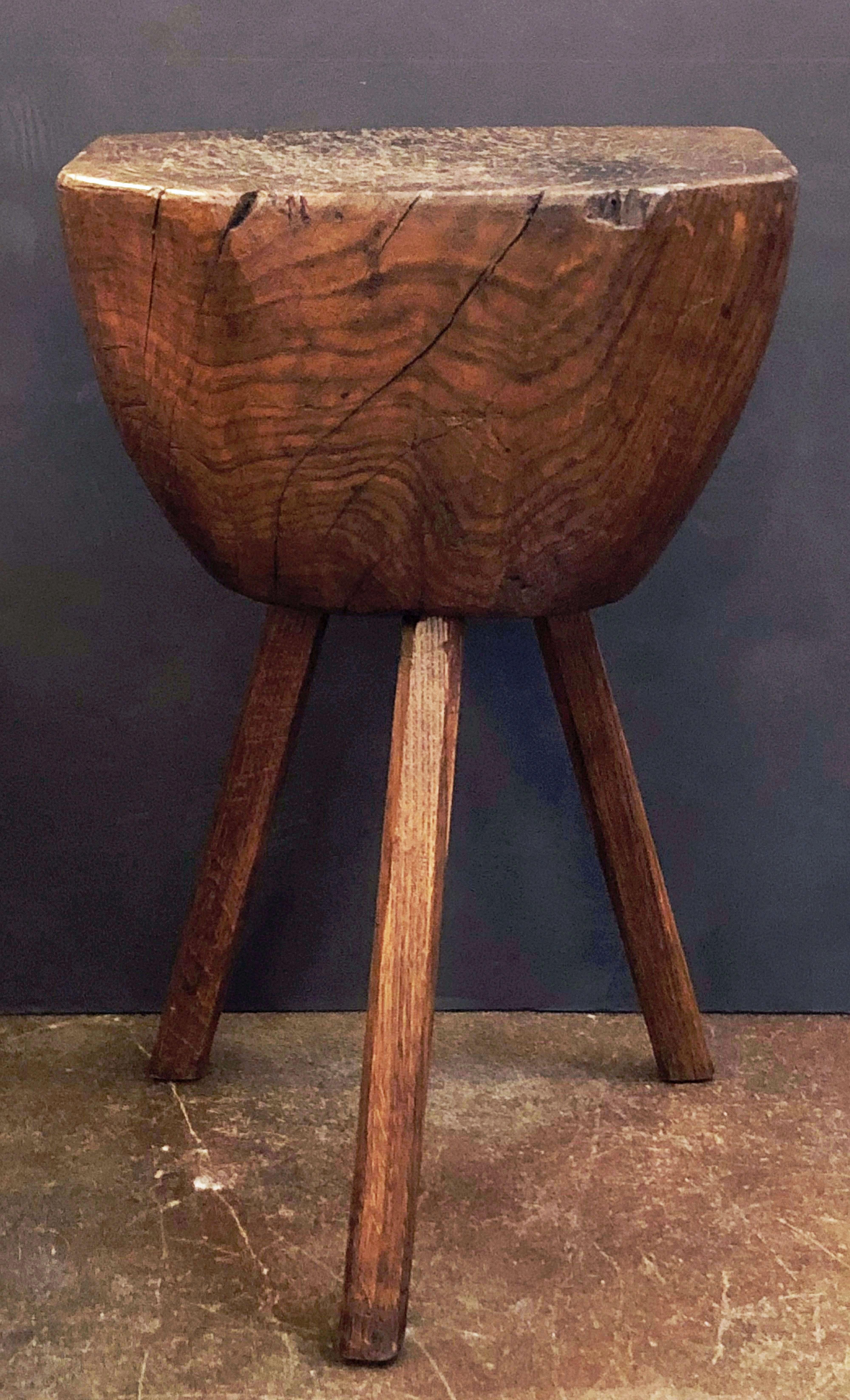 A handsome primitive or rustic chopping block stand from France, of finely patinated chestnut wood - Makes a great side or occasional table.