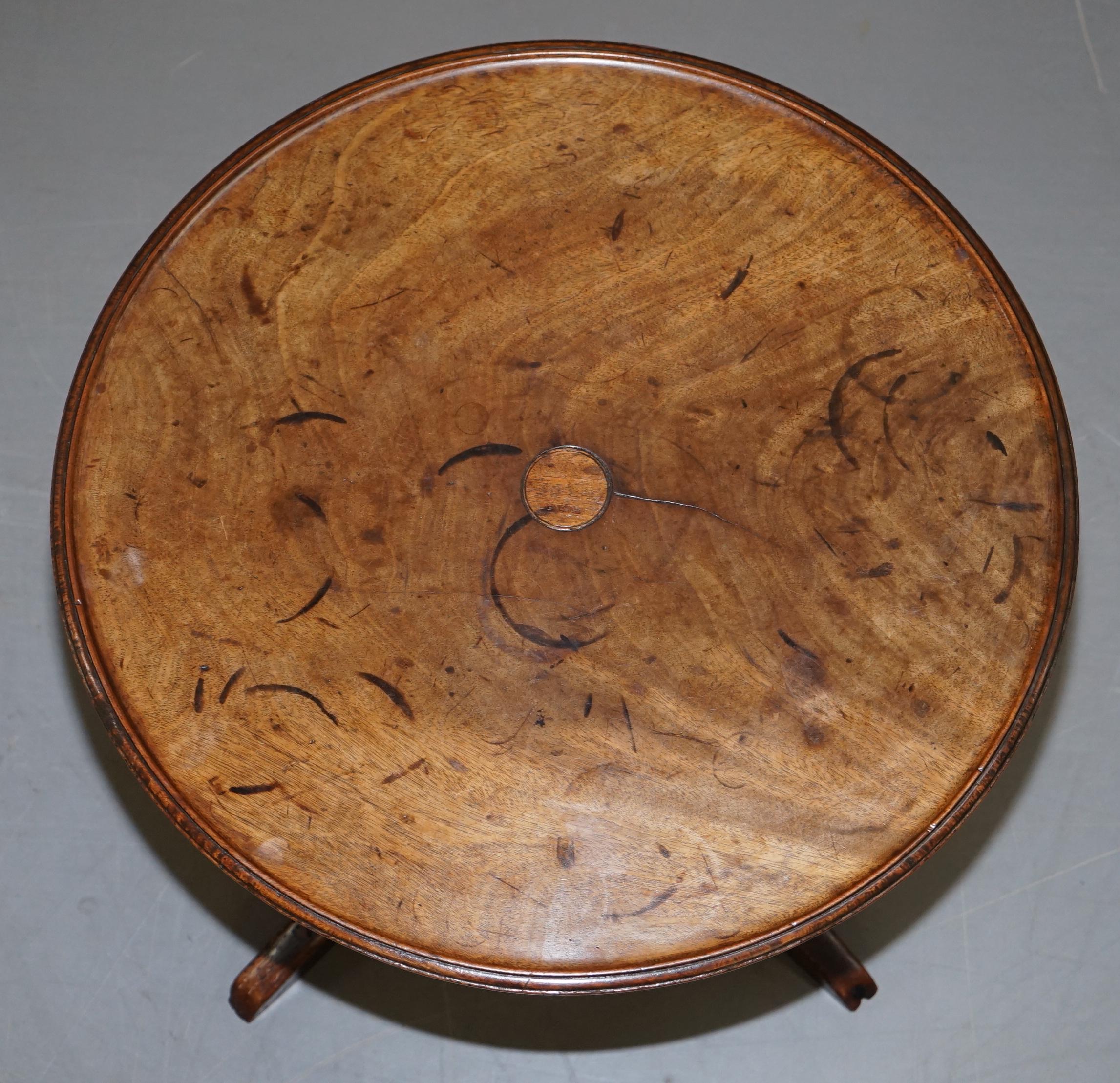 We are delighted to offer for sale this circa 1840 early Victorian round side end lamp wine table with lots patination

A very decorative and period table, the piece has plenty of old repairs, marks and age-related patina marks all-over, it must