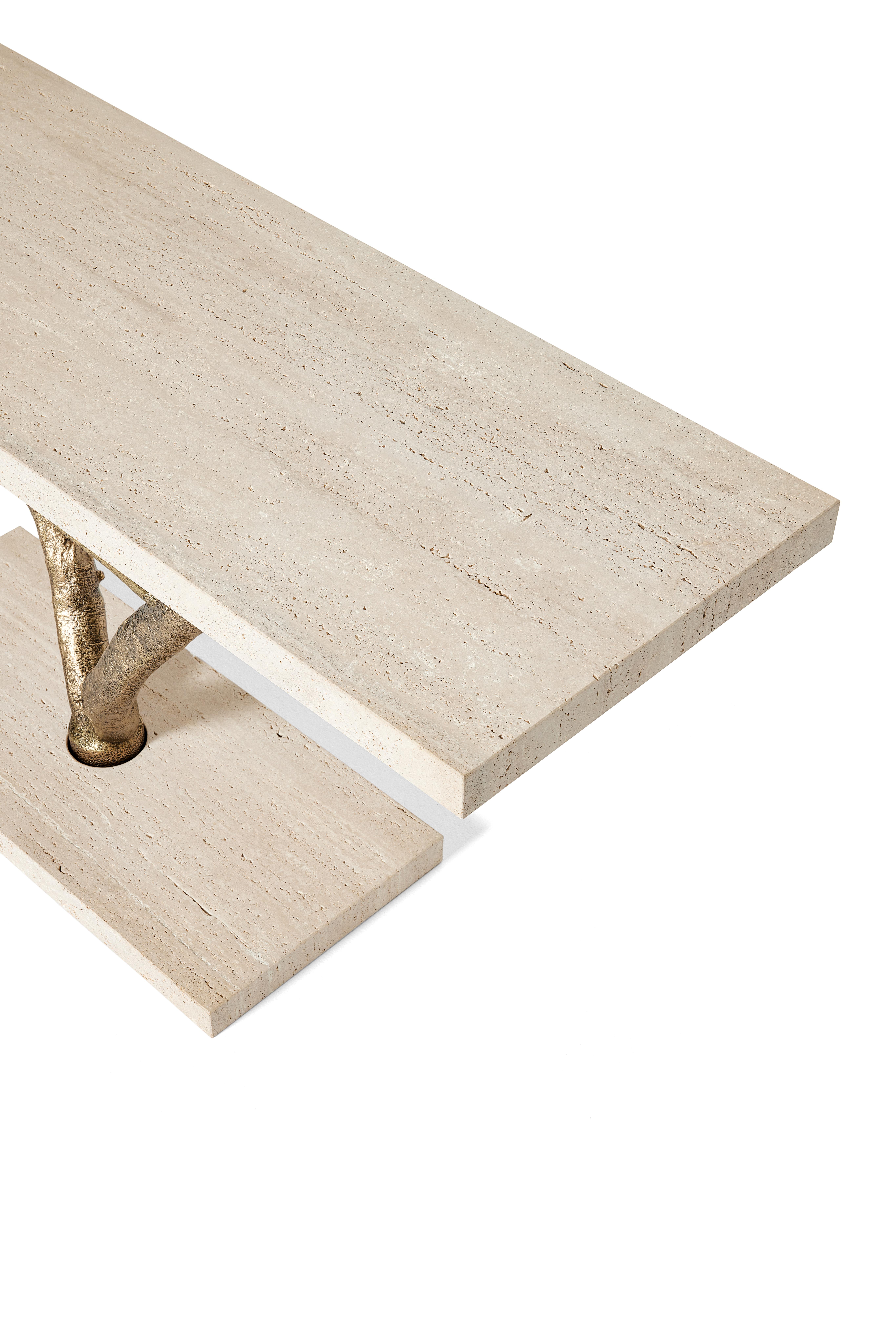 Primitive Console by Ginger & Jagger
Dimensions: D 50 x W 180 x H 81 cm. 
Materials: Romano Travertine stone and brass.
Finish: Top and base in Romano Travertine stone in natural finishing; structure in molded cast Brass in Antique Brass