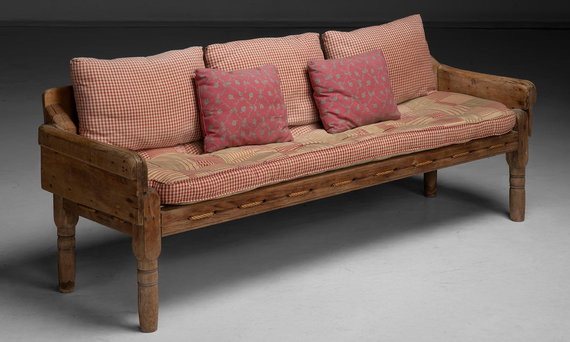 Primitive Country Settee

America, 1850

Low back, heavy corner posts with turned legs, cushion and pillows in patterned fabrics.

72”w x 22”d x 25”h x 17”seat

Ref. SOFA309