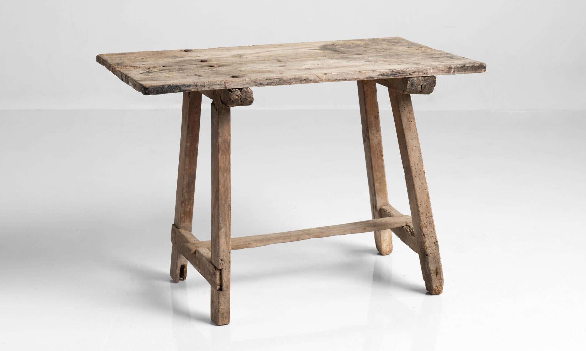 Primitive country table, England, circa 1890.

Beautifully patinated form with stretcher support.