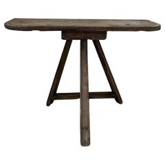 Primitive demi lune side console table