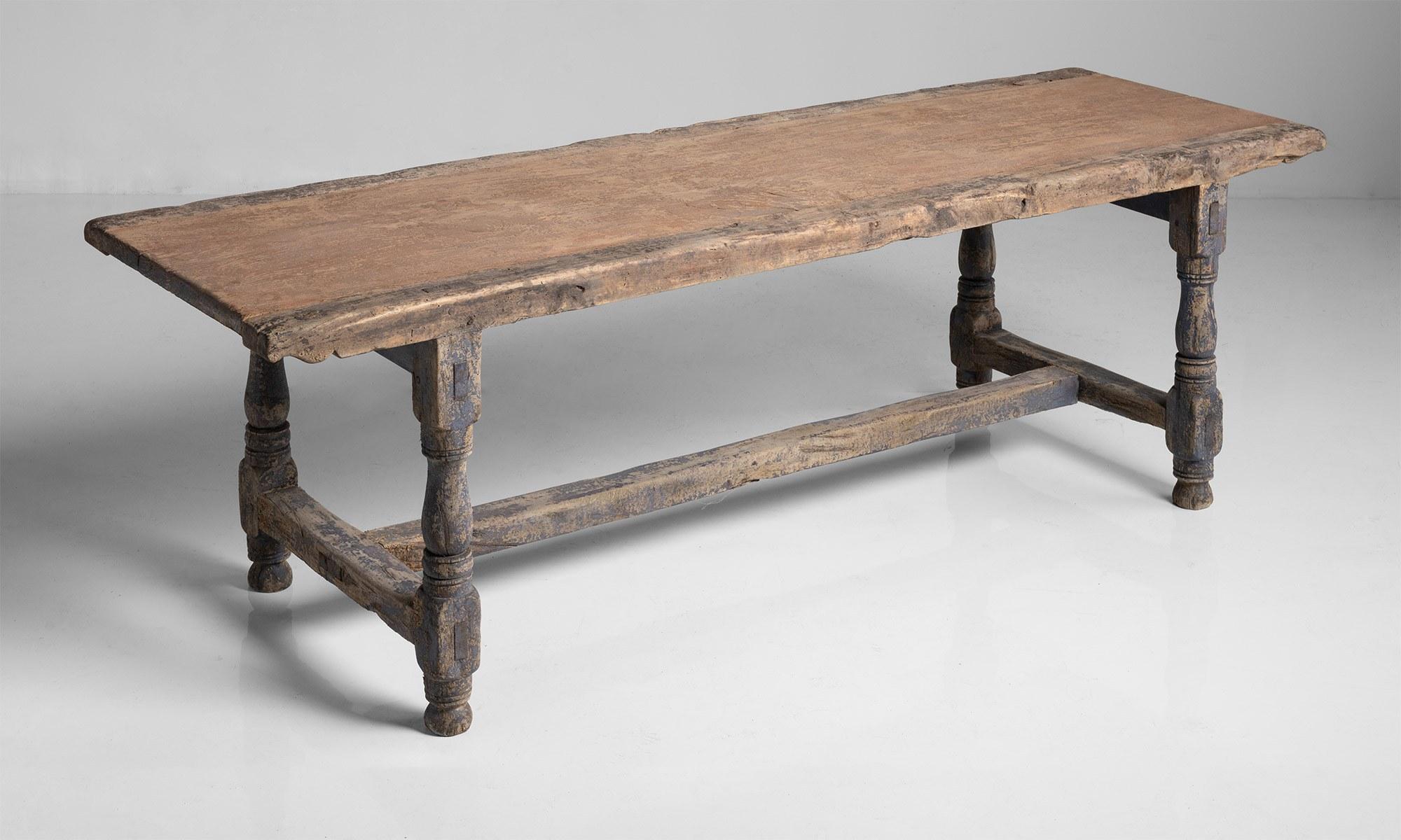 Constructed in oak and pine, with turned legs and remnants of original paint.